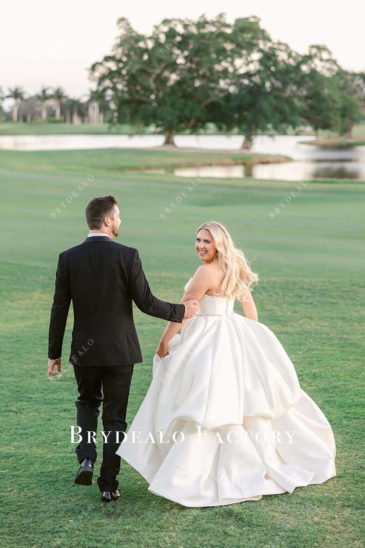white puffy a line wedding dress