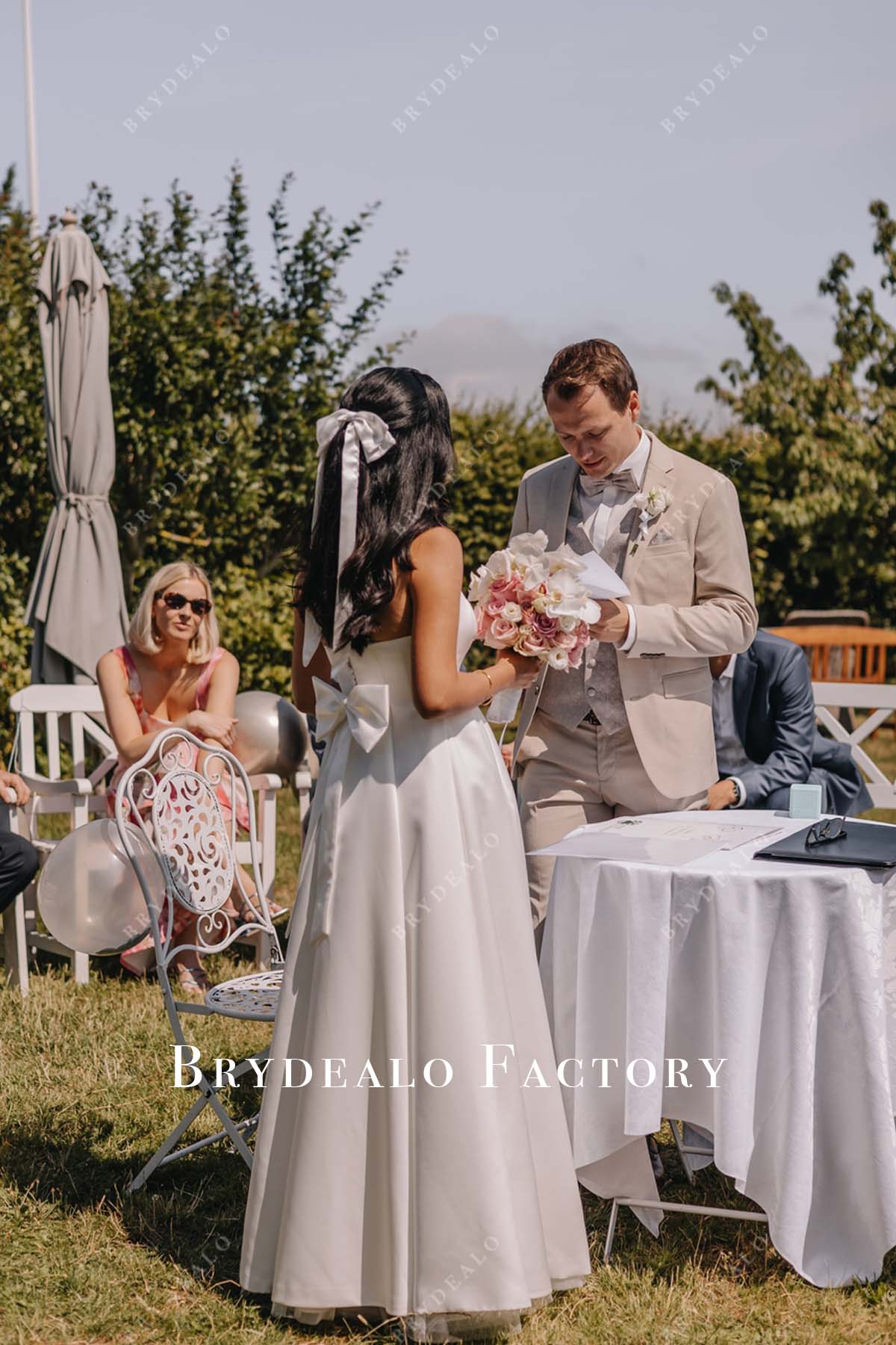 white satin A-line wedding dress