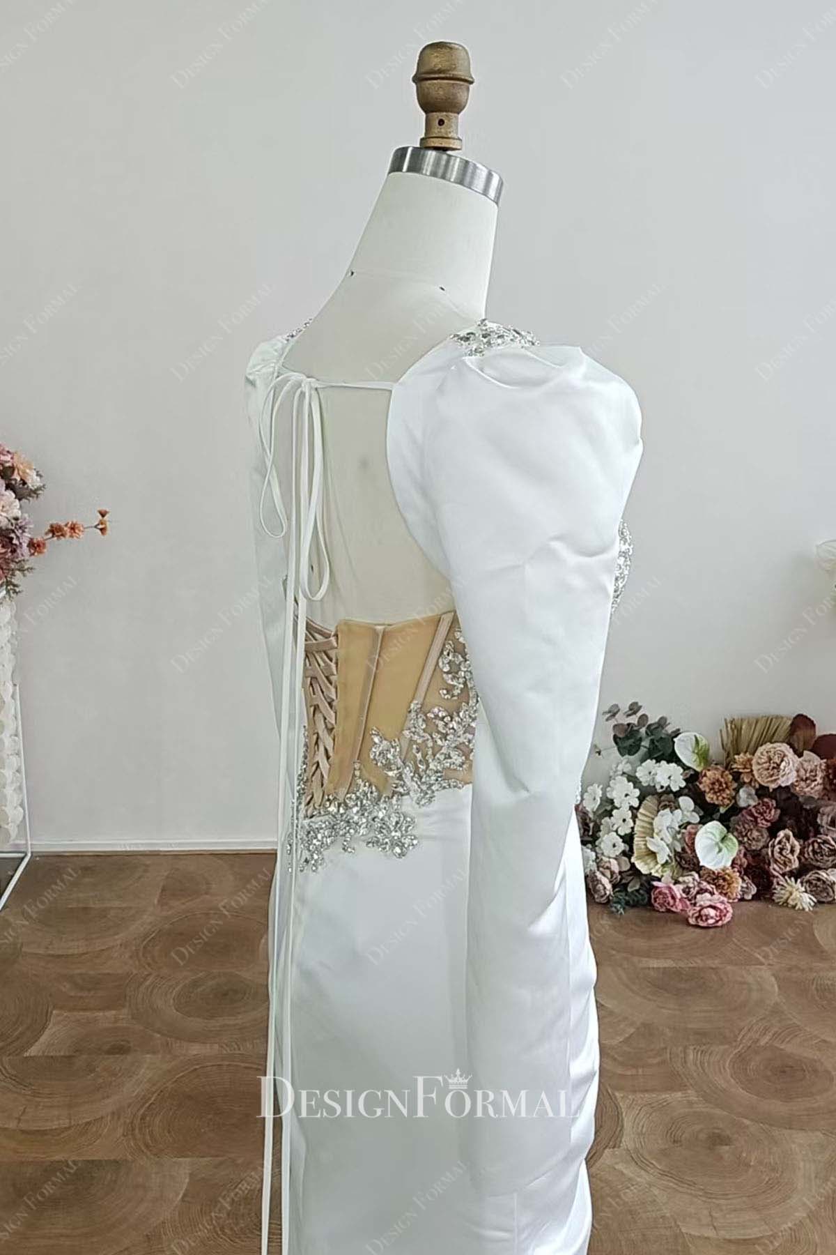 white satin long sleeve bridal dress