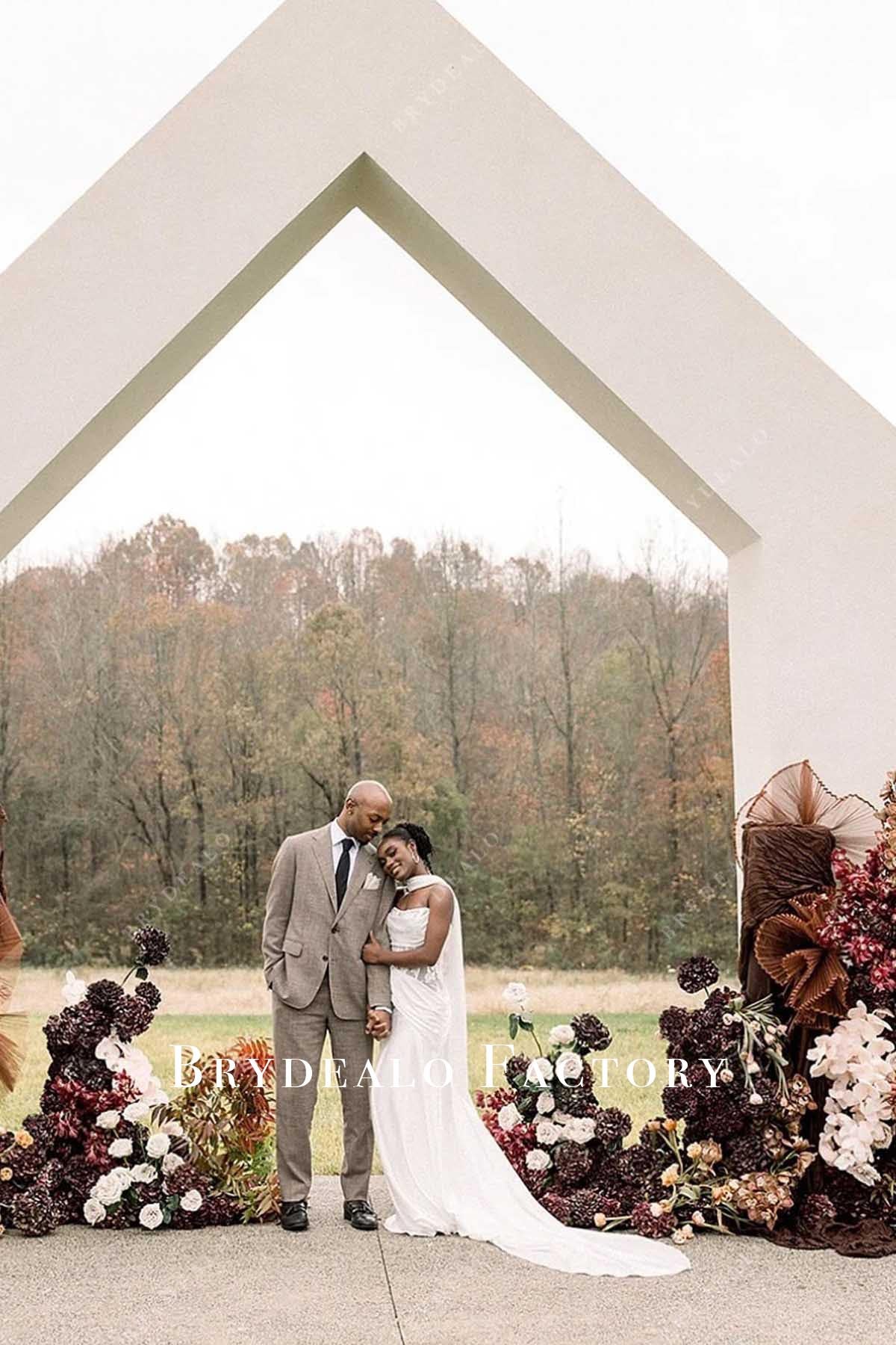 white strapless court train wedding dress