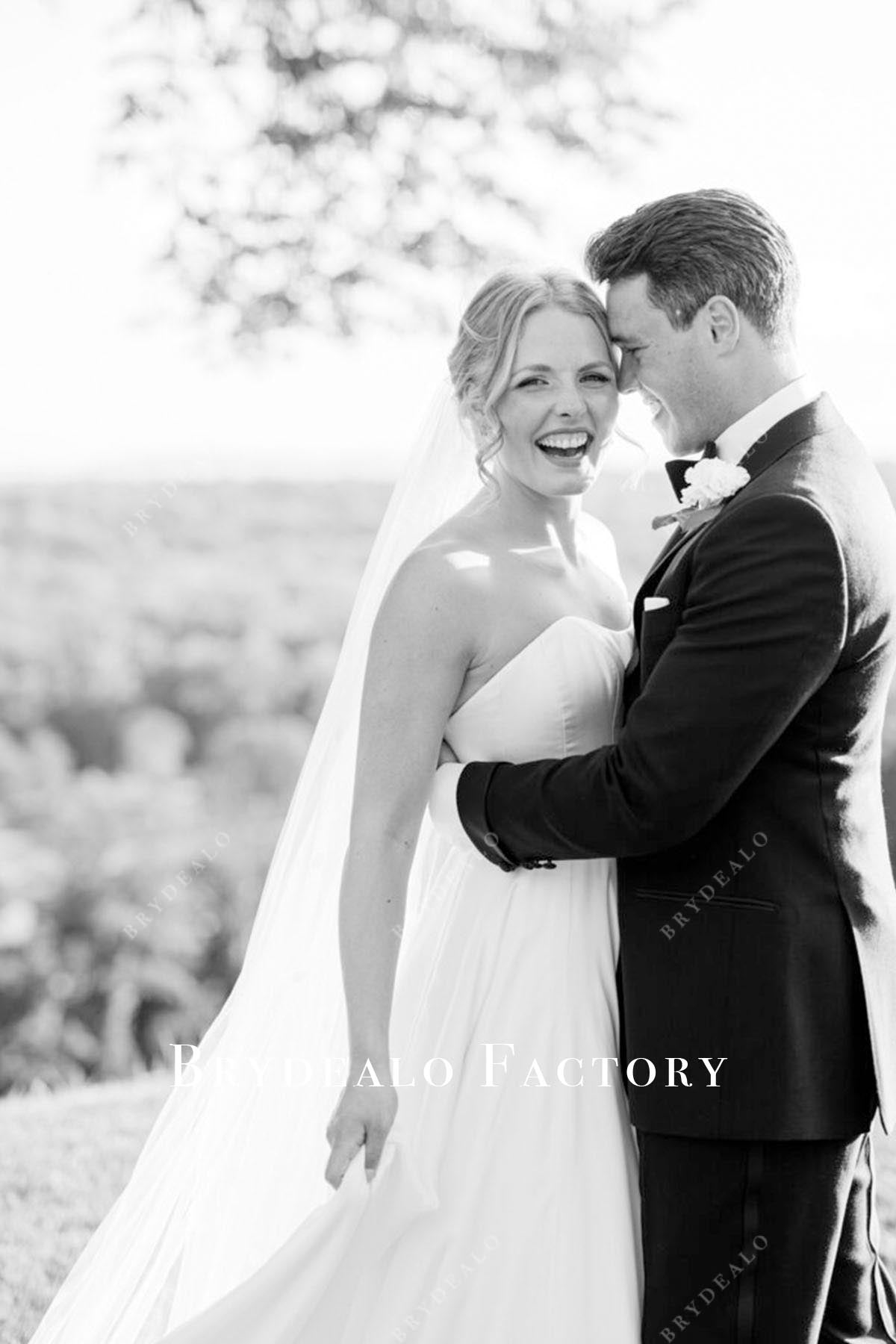 white sweetheart neck wedding dress