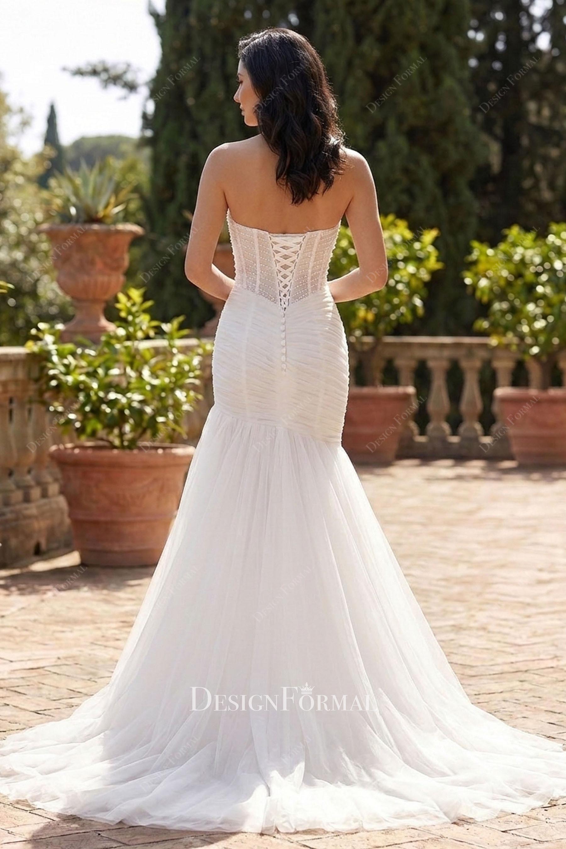white tulle strapless trumpet bridal dress