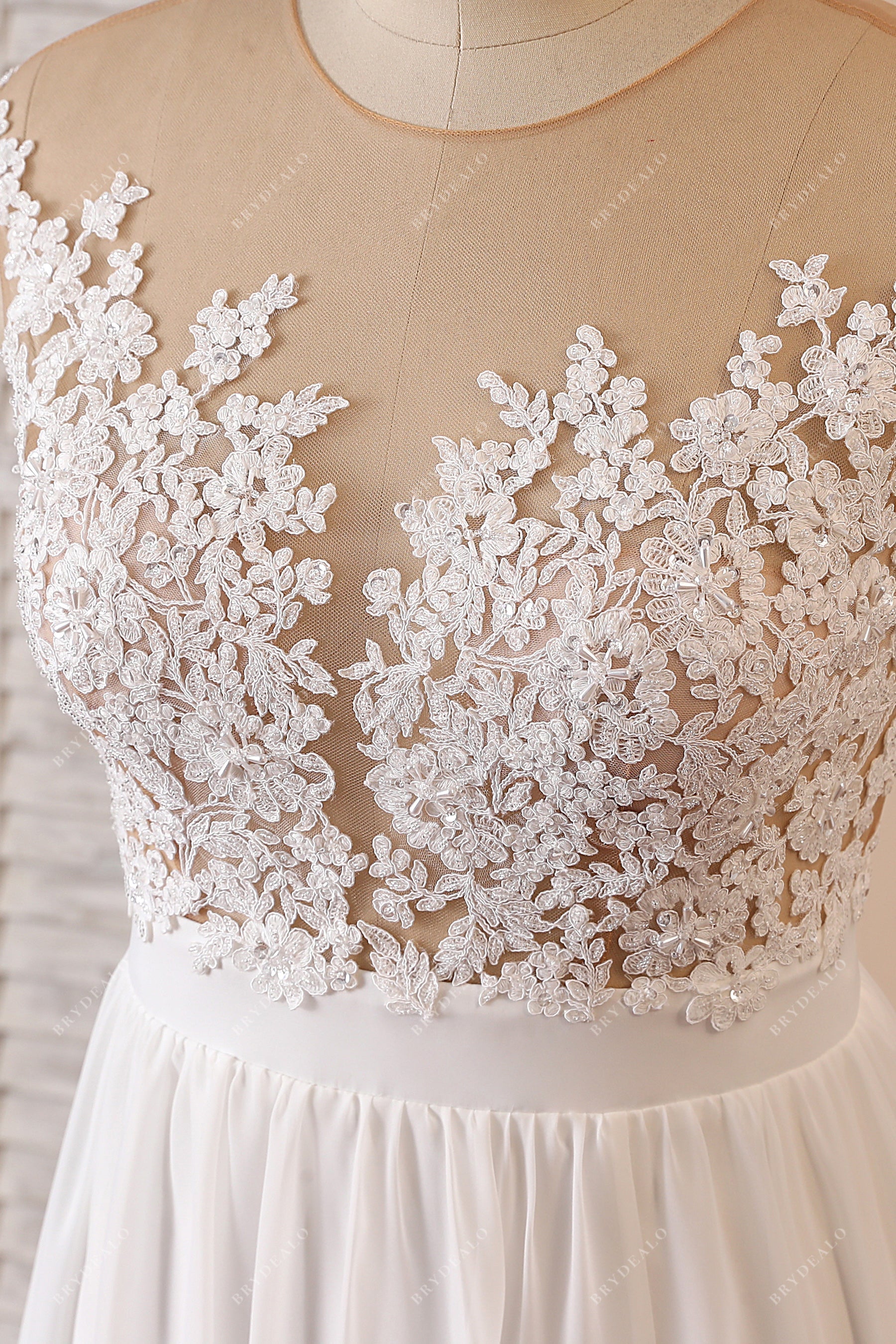 designer lace illusion neck wedding gown