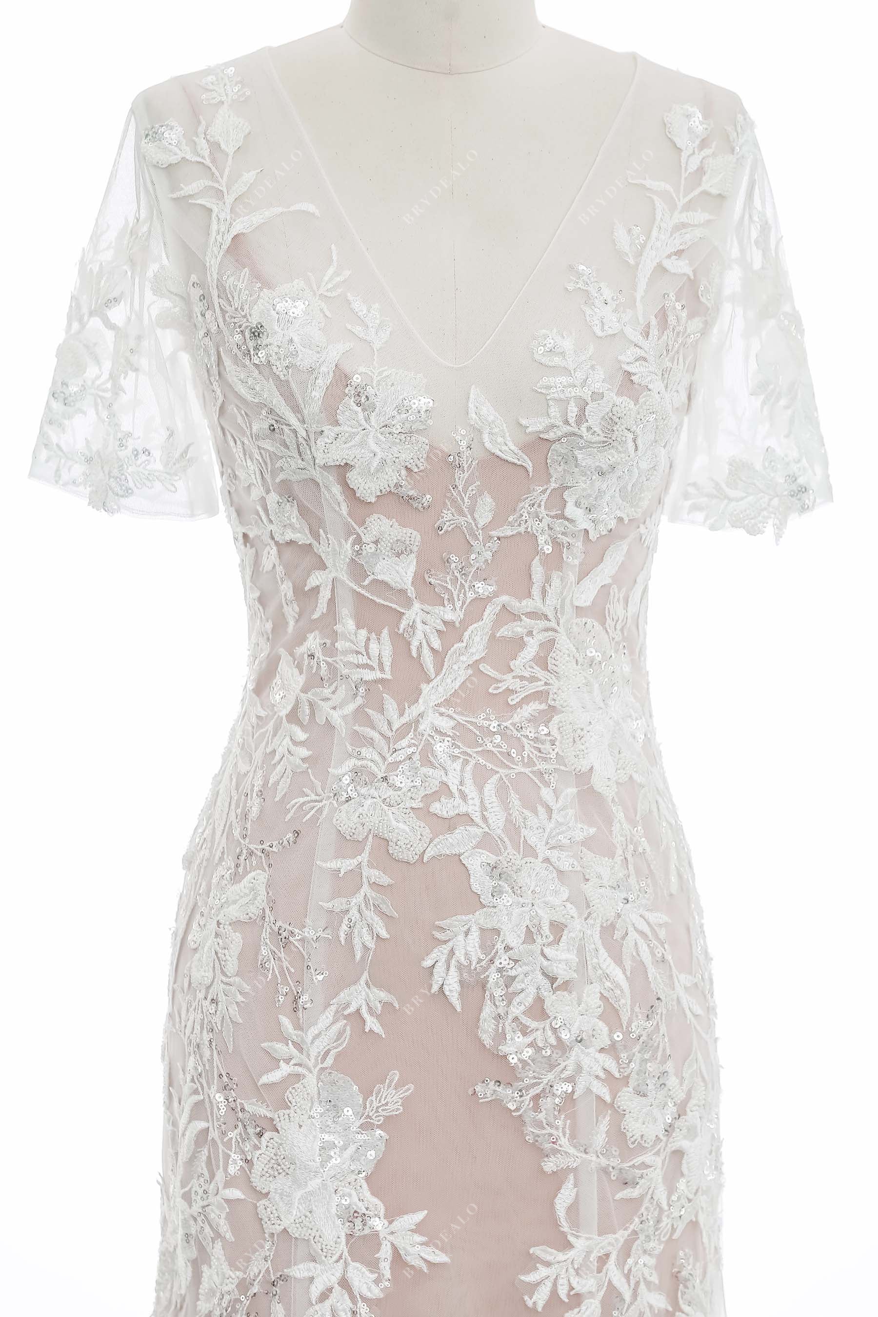 ivory lace appliques overlaid dusty rose bridal gown