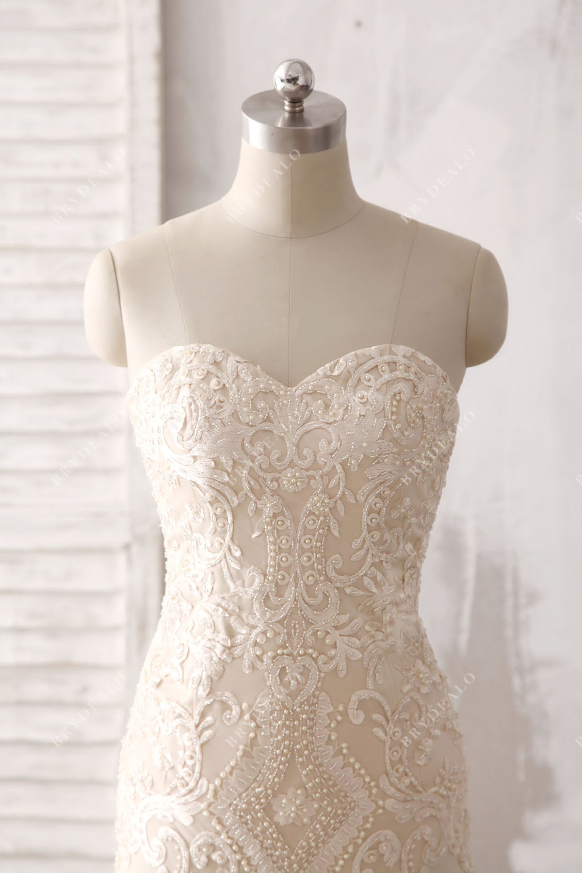 destination strapless sweetheart beaded champagne wedding dress