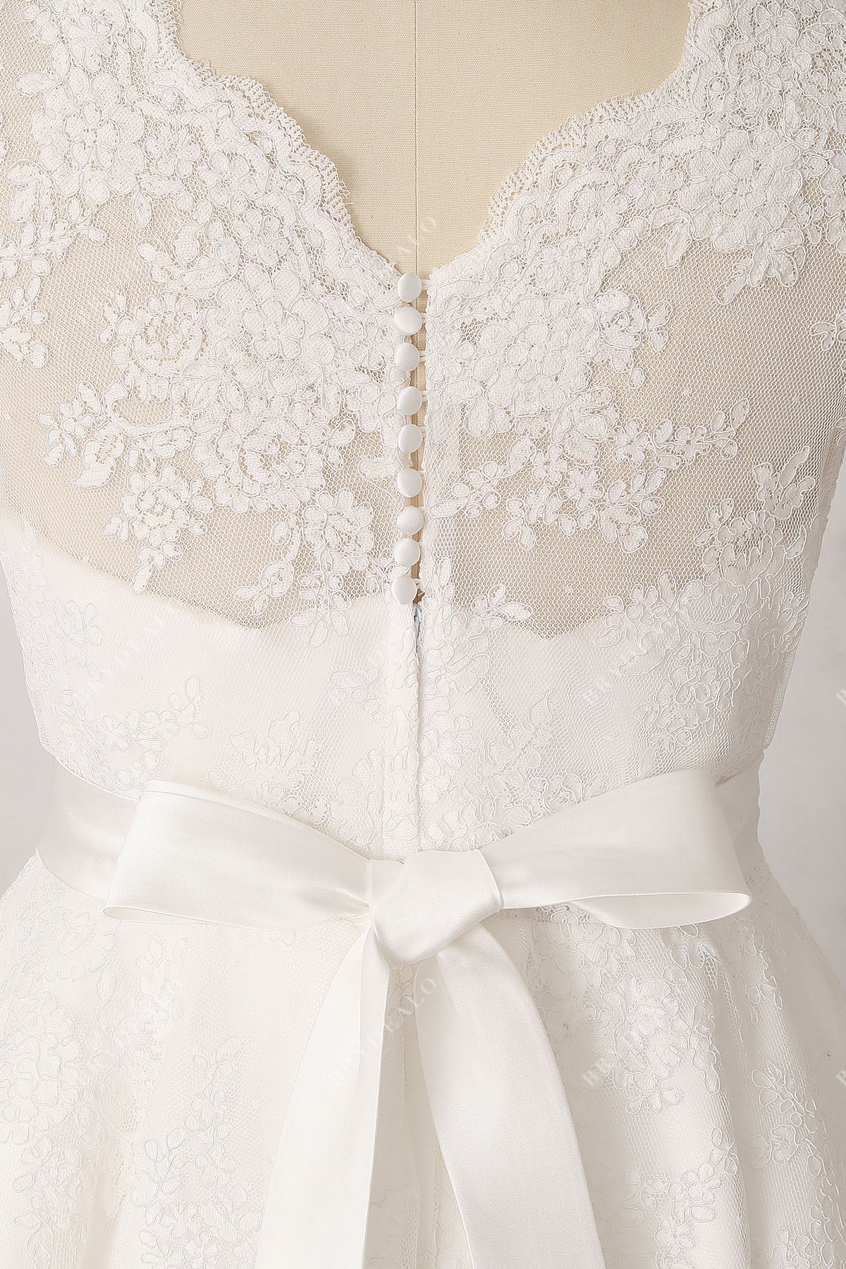 buttons decorated illusion back city bridal dress