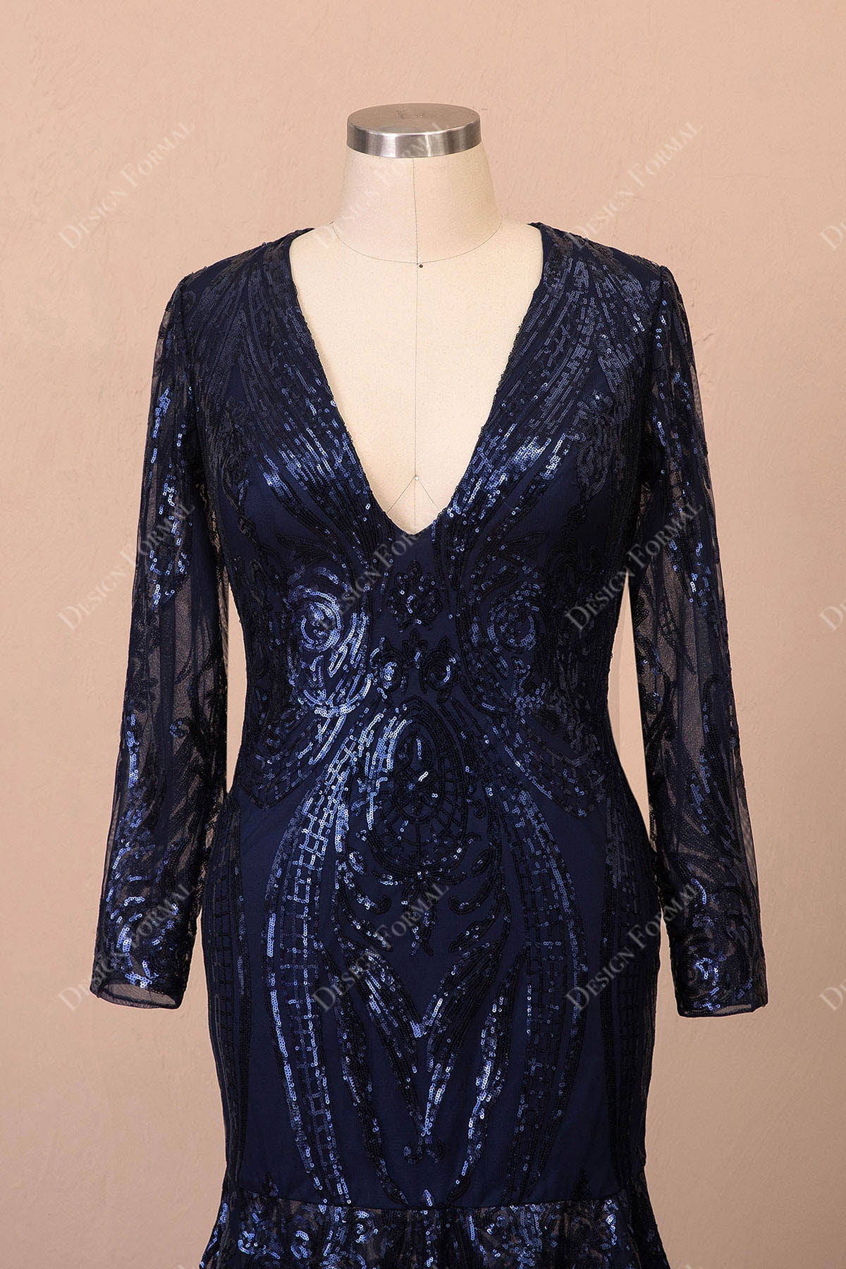 navy sequin bodice with V-neck and long sleeves