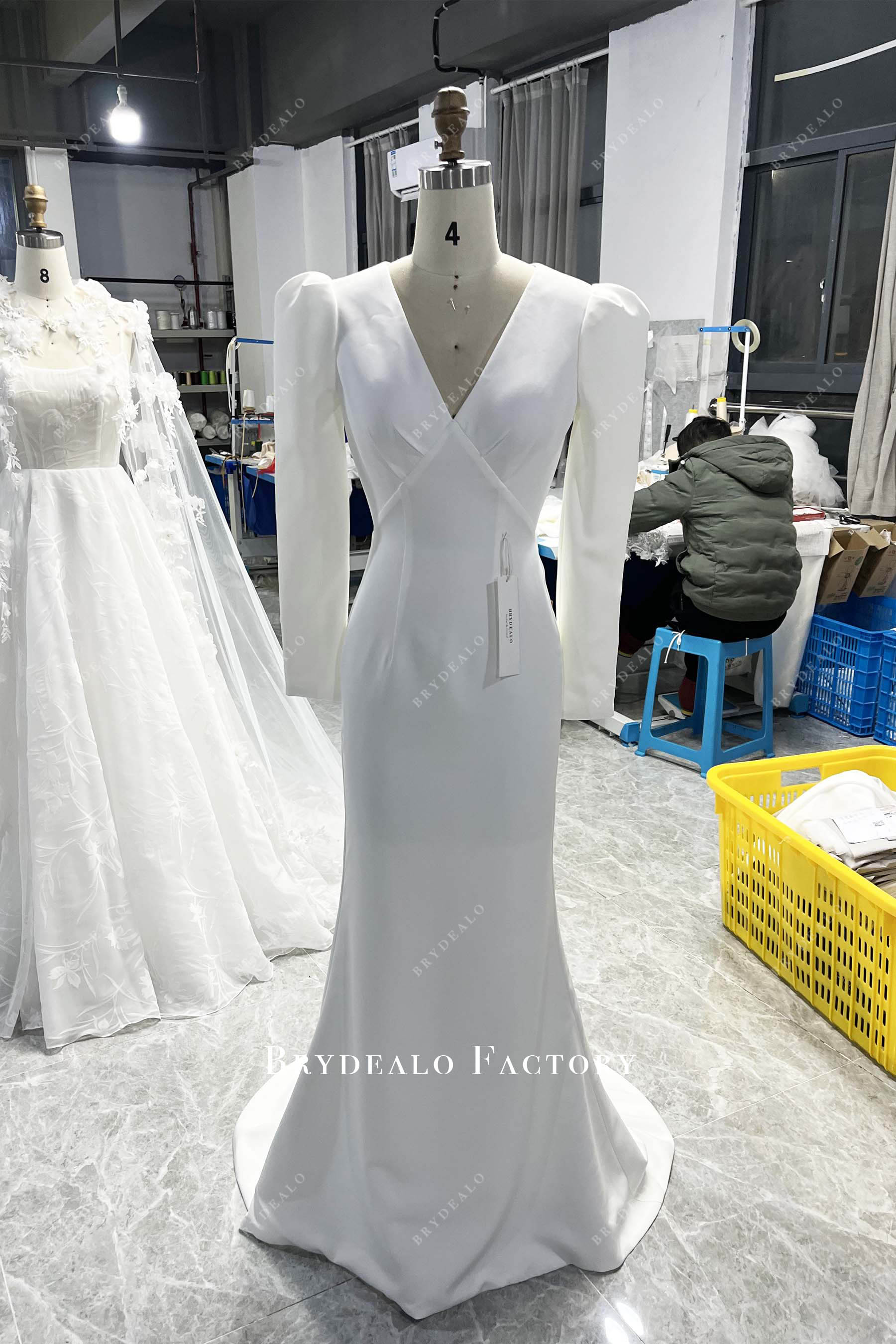 designer poofy sleeve mermaid bridal gown