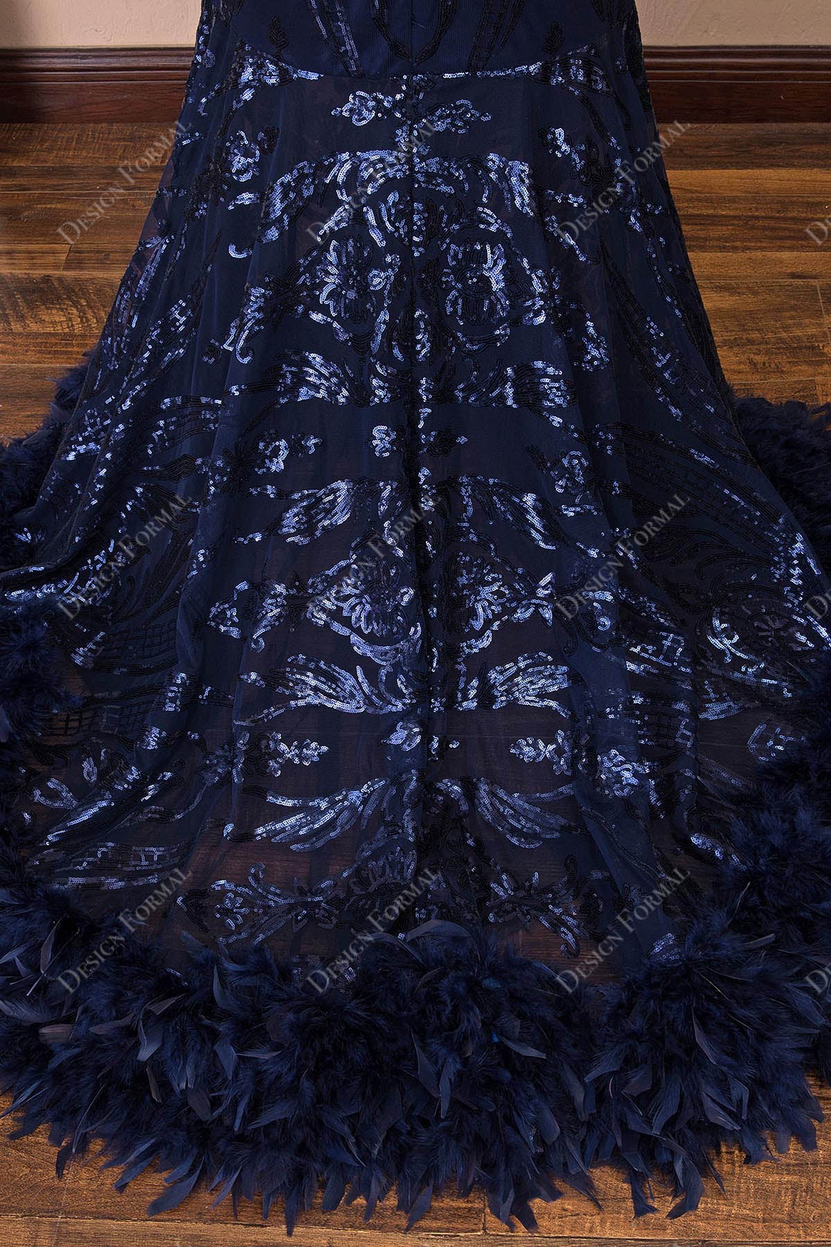 feather hemline of mermaid prom dress