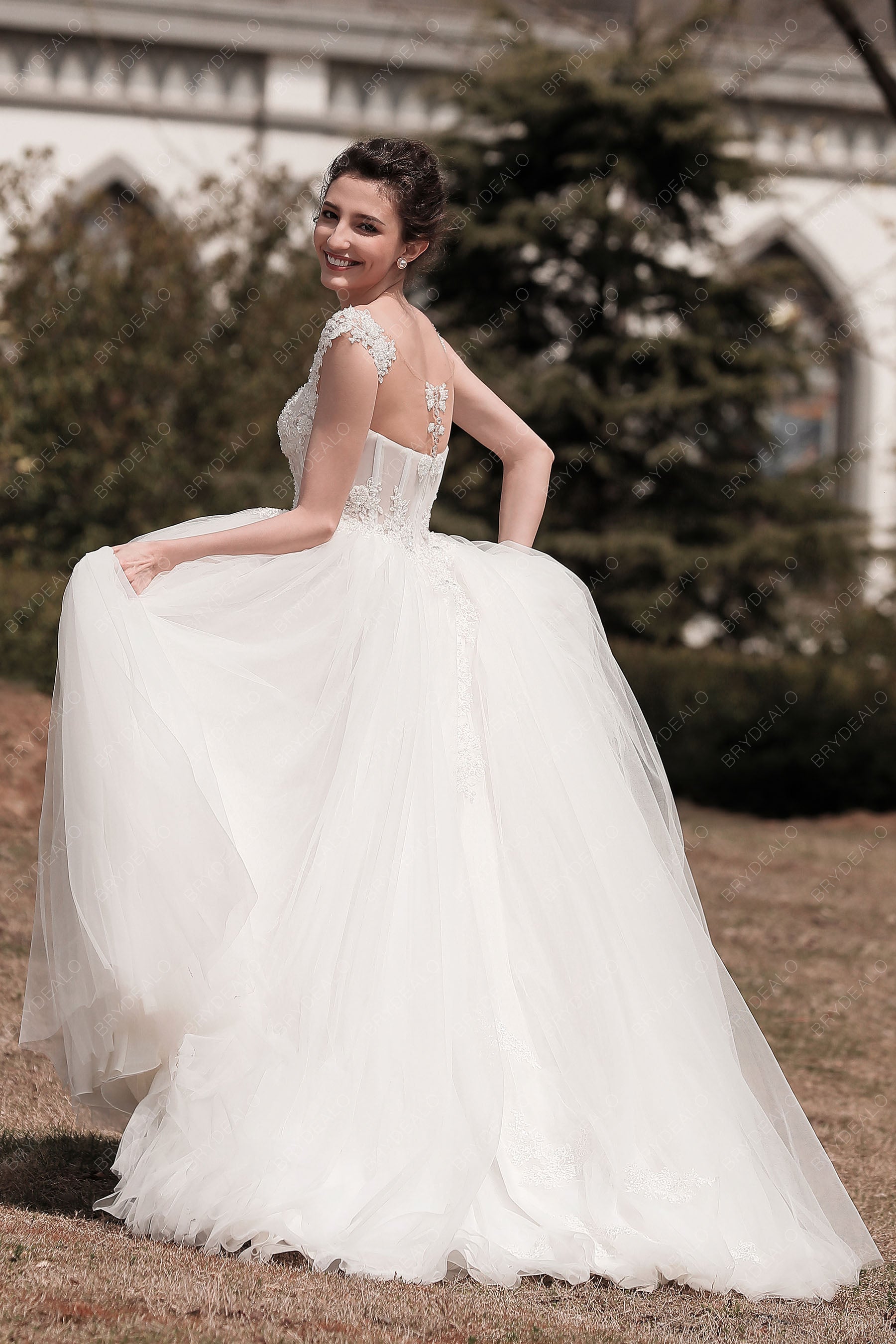 illusion back destination puffy A-line wedding dress