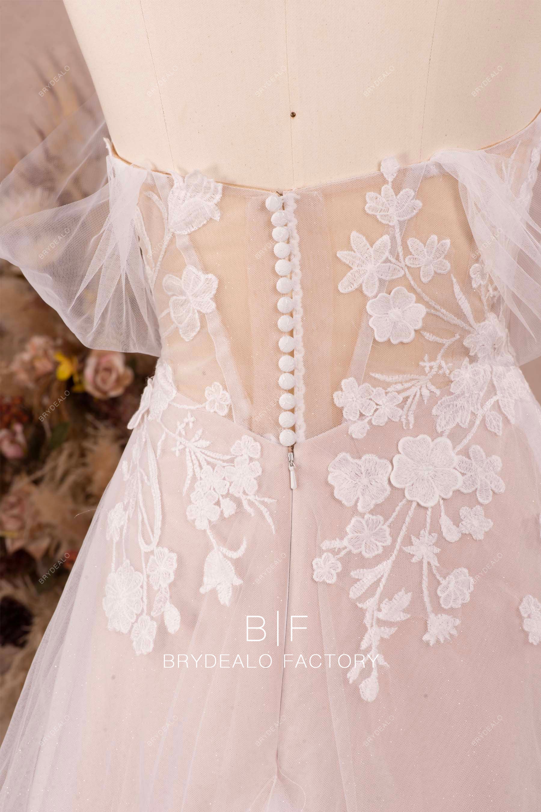 illusion buttoned back lace garden bridal gown