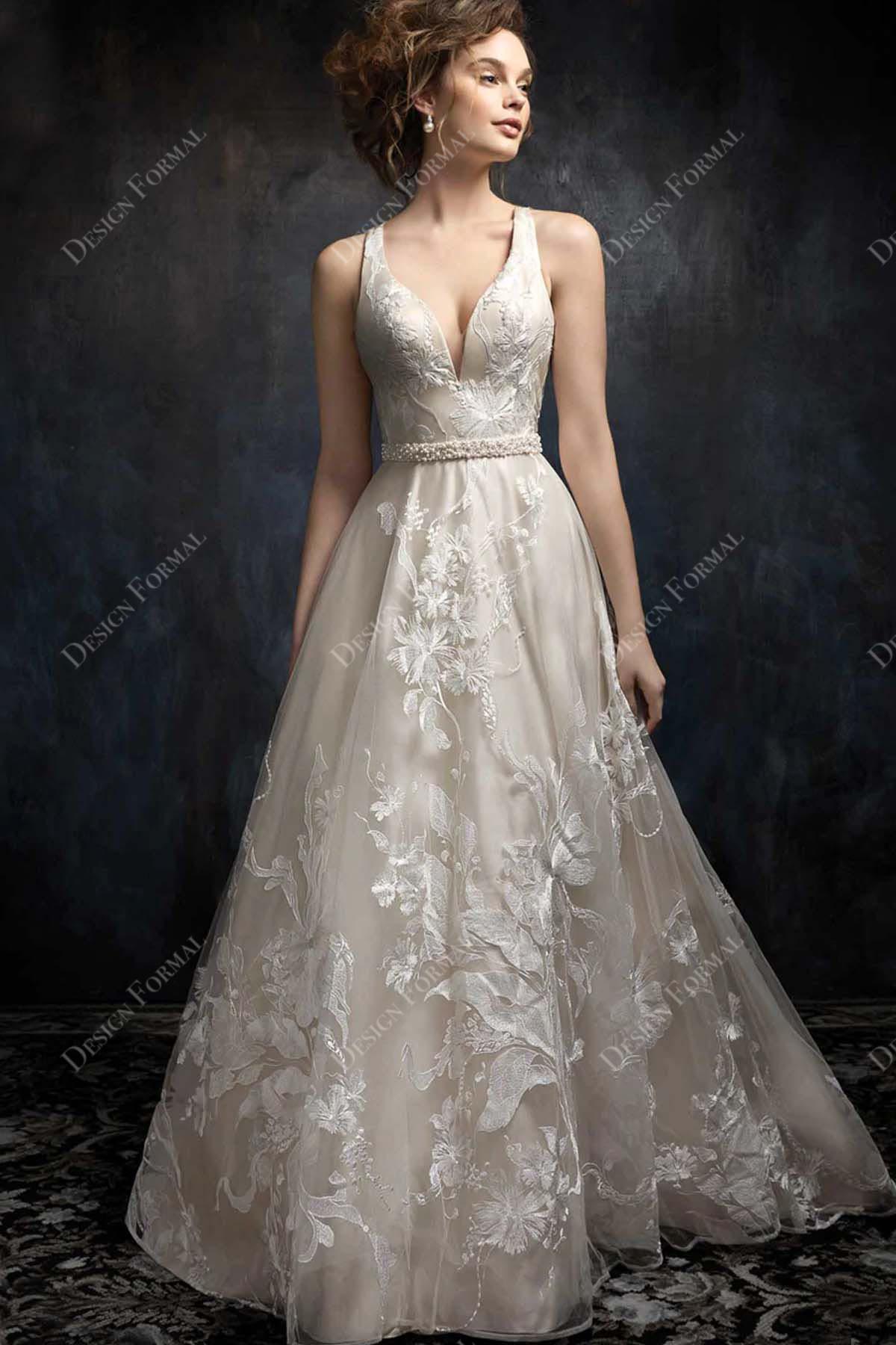 ivory lace overlaid champagne A-line designer wedding dress