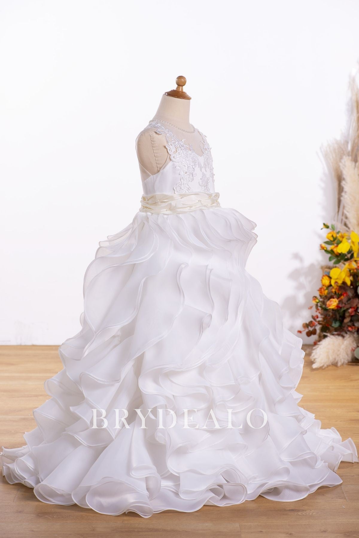 sleeveless floor length ruffled organza flower girl wedding ball gown
