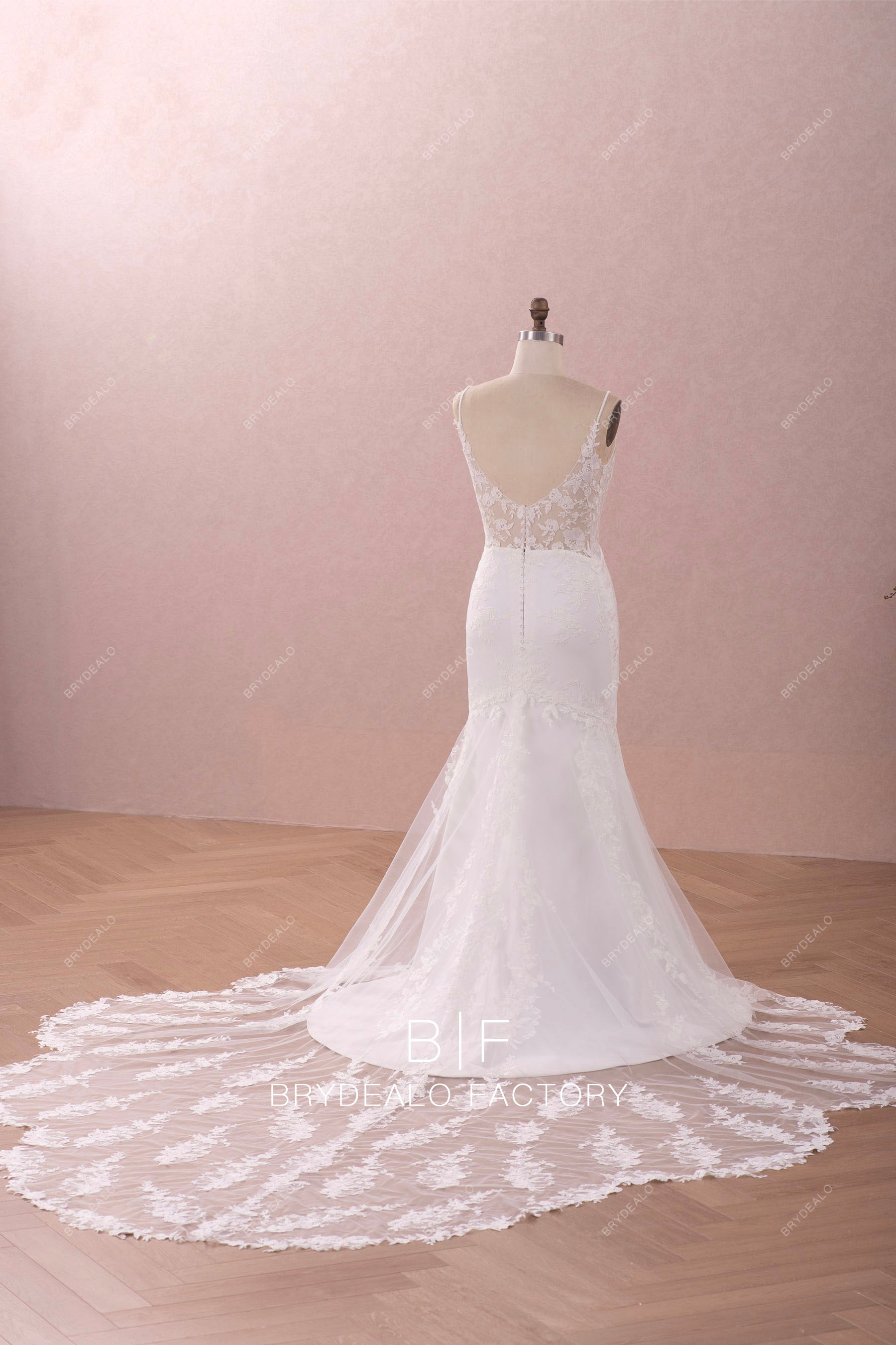 long designer lace cutout train wedding dress
