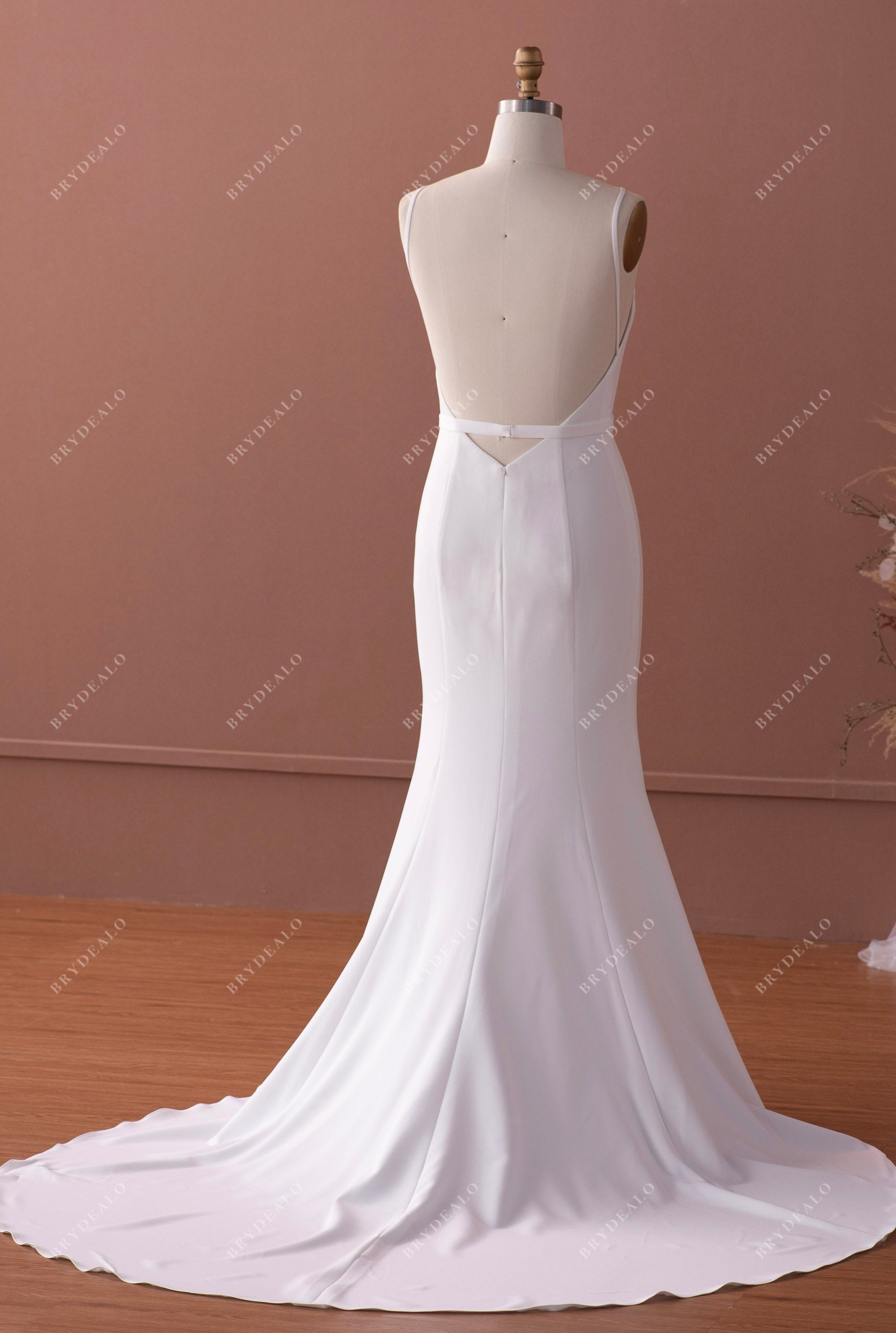 long train open back mermaid crepe bridal gown