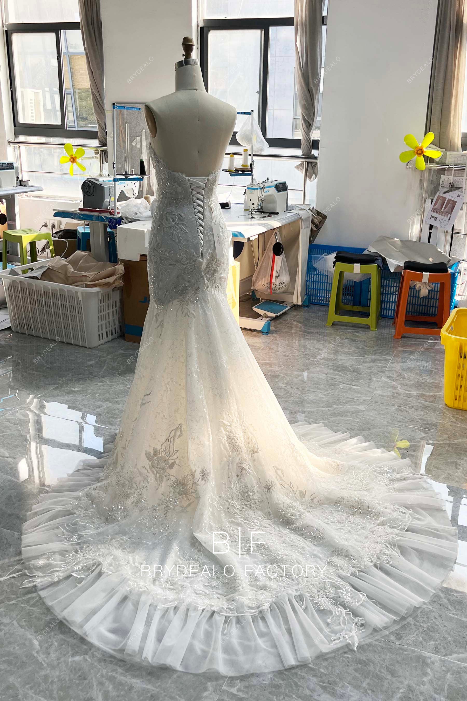 ruffled long train lace corset bridal gown