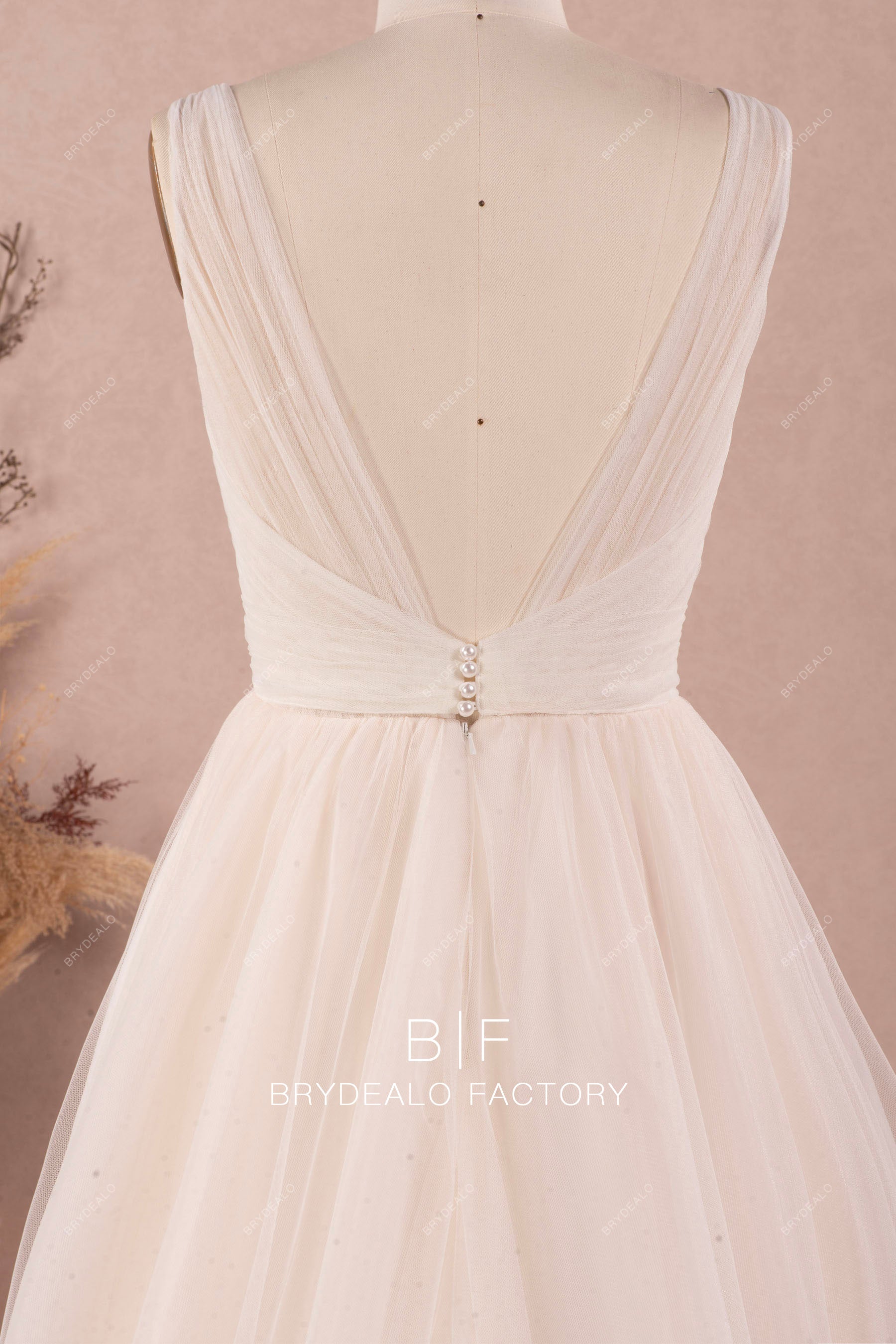 open pleated back pearl closure fall wedding gown