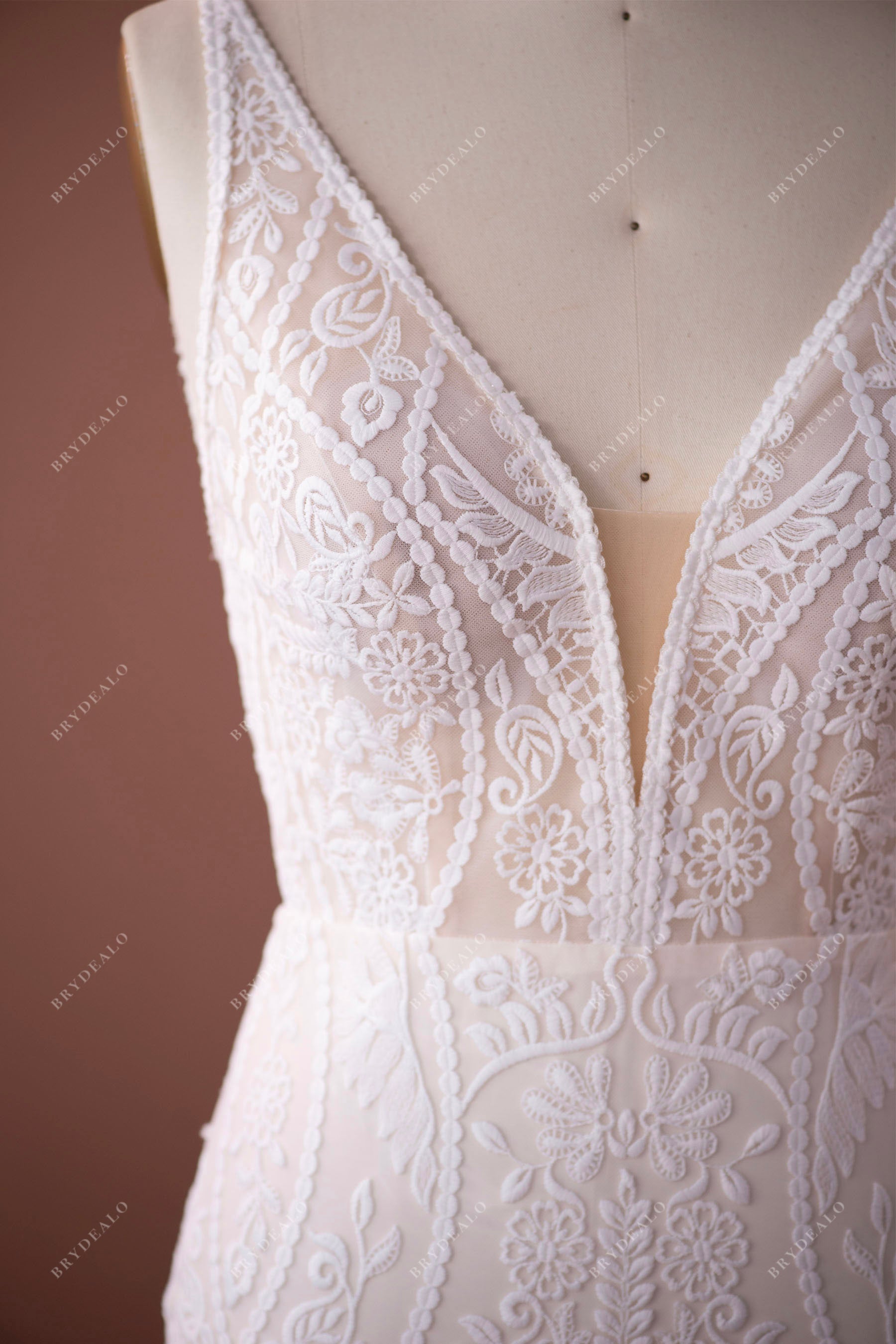 plunging neck sleeveless boho lace wedding dress