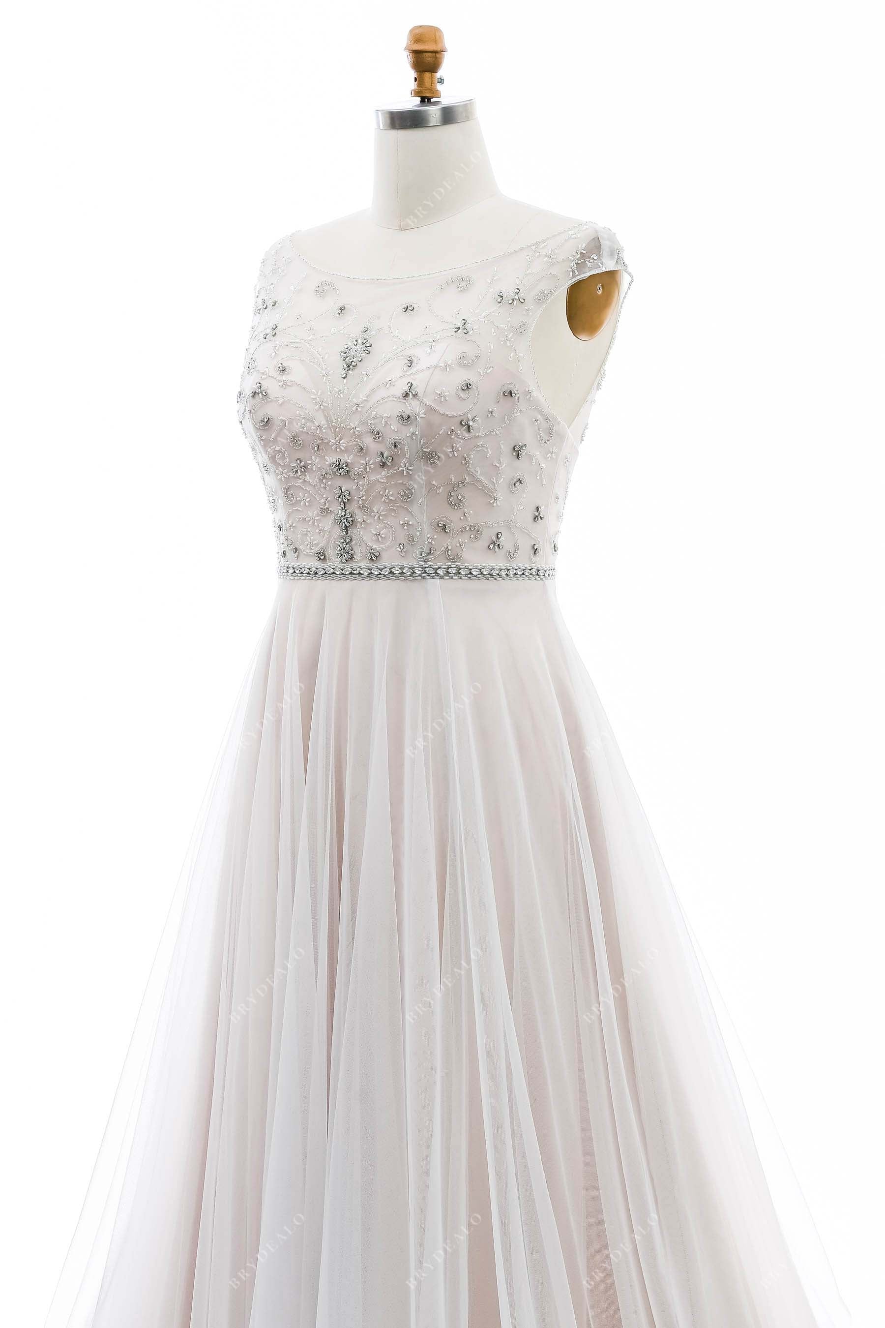 sheer cap sleeves designer nude pink colored bridal gown