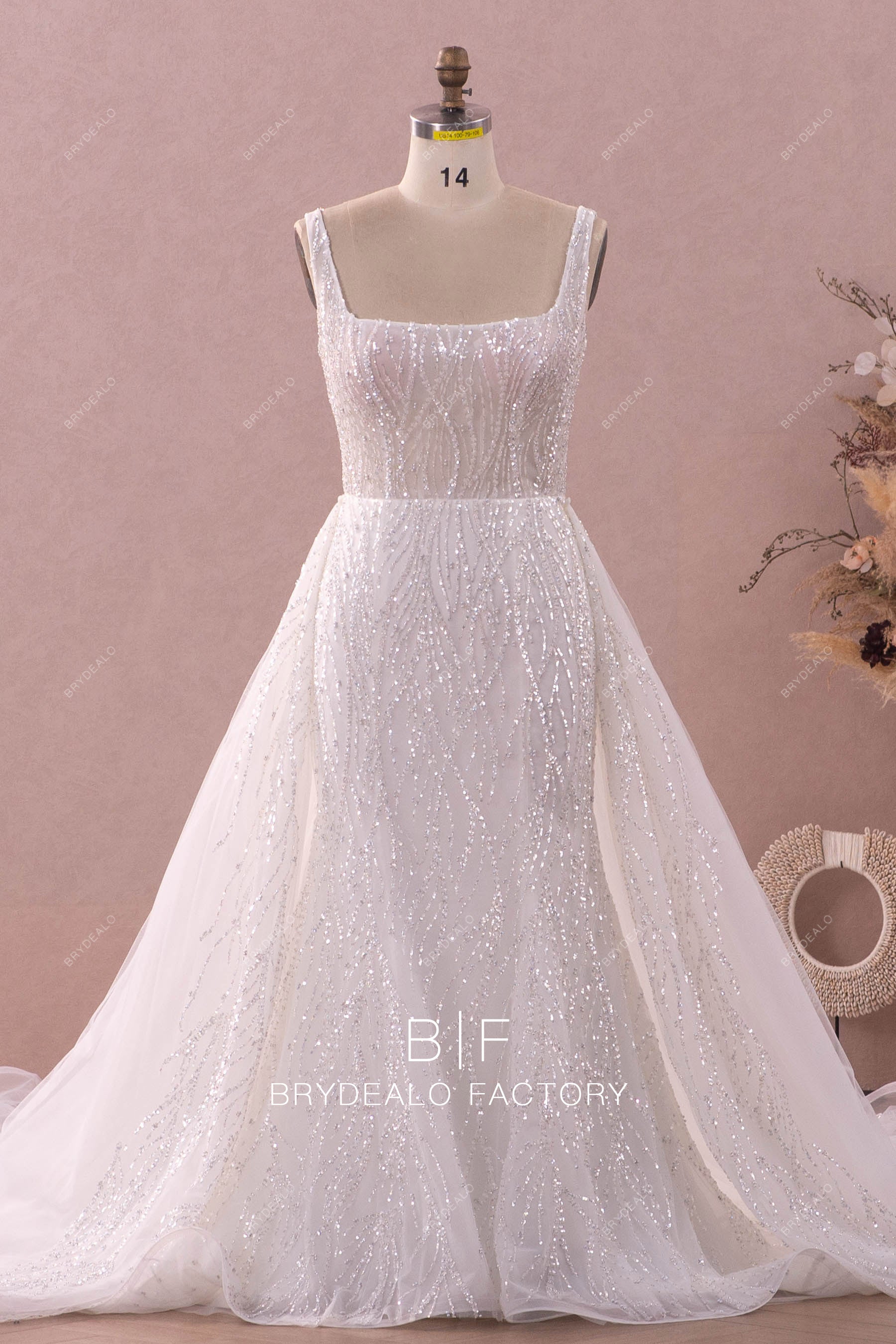 removable ruffled overskirt modern wedding dress
