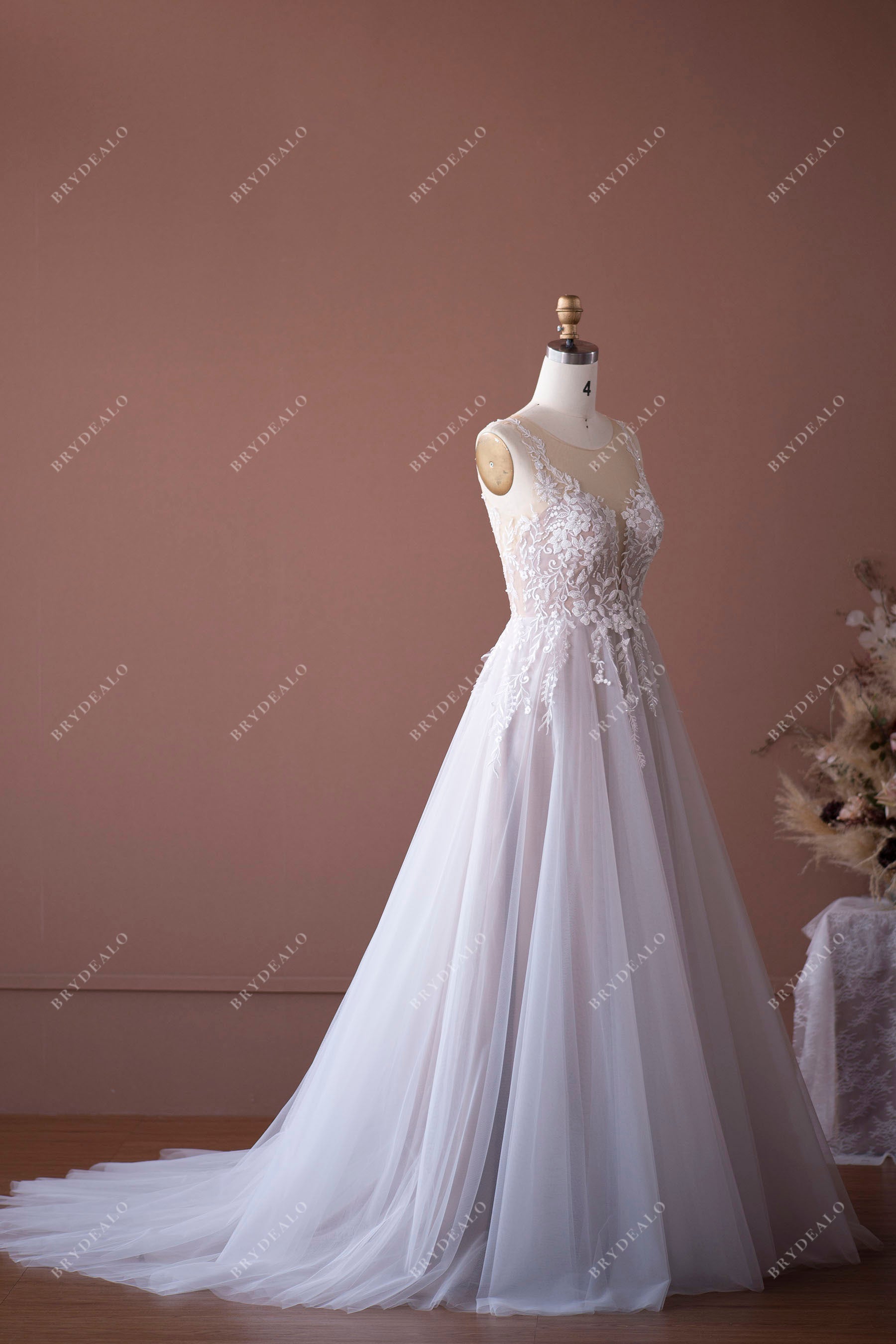 long train sleeveless destination wedding ball gown
