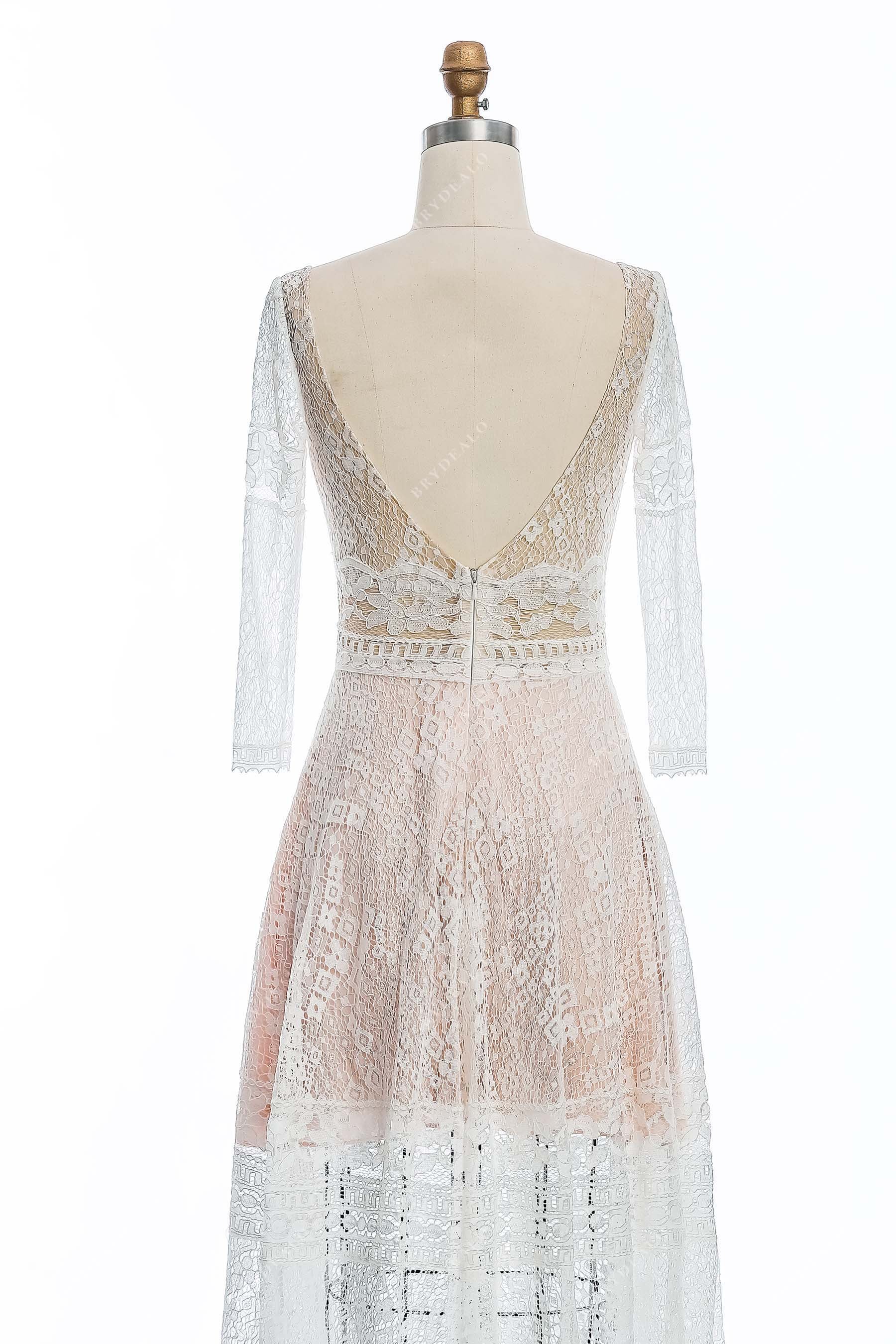 sheer lace sleeves V-back nude city bridal gown