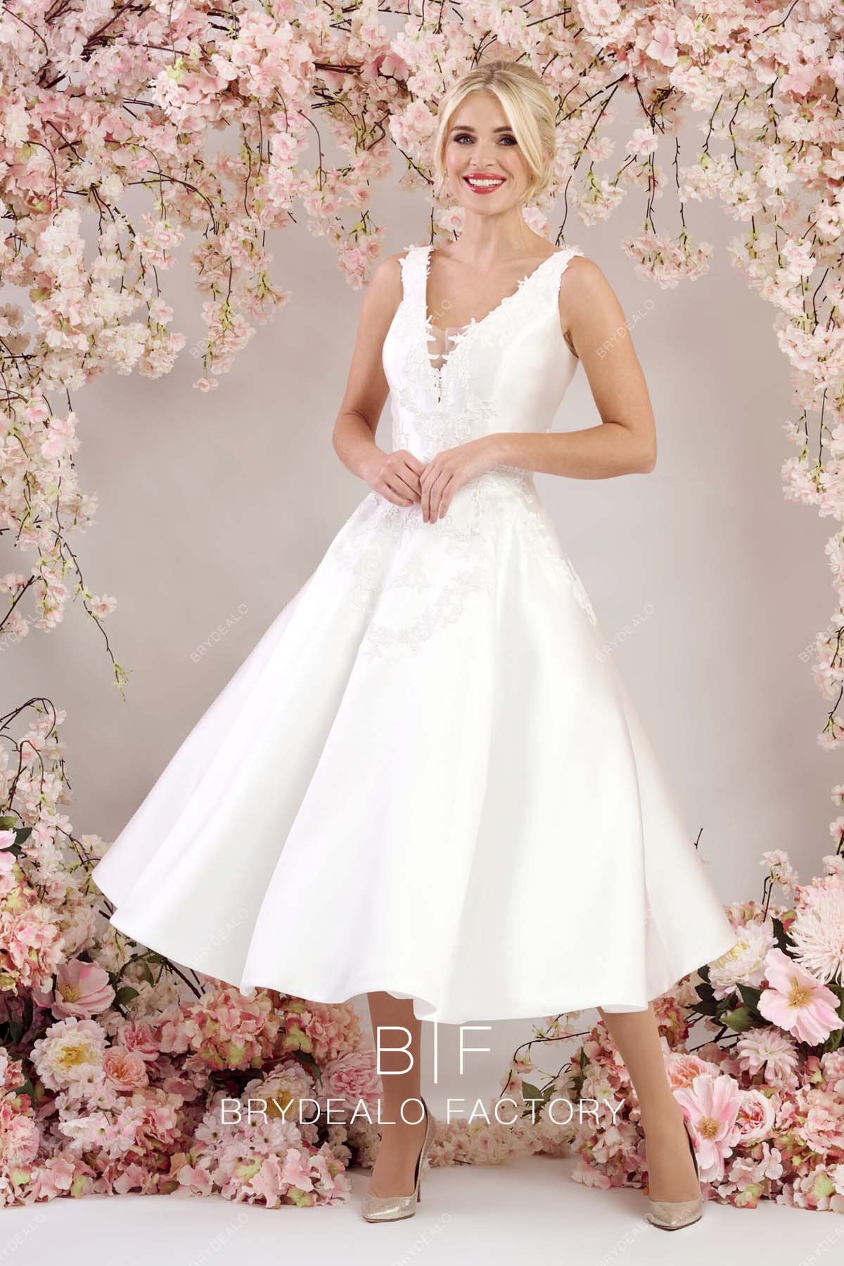 sleeveless plunging neck short custom wedding gown