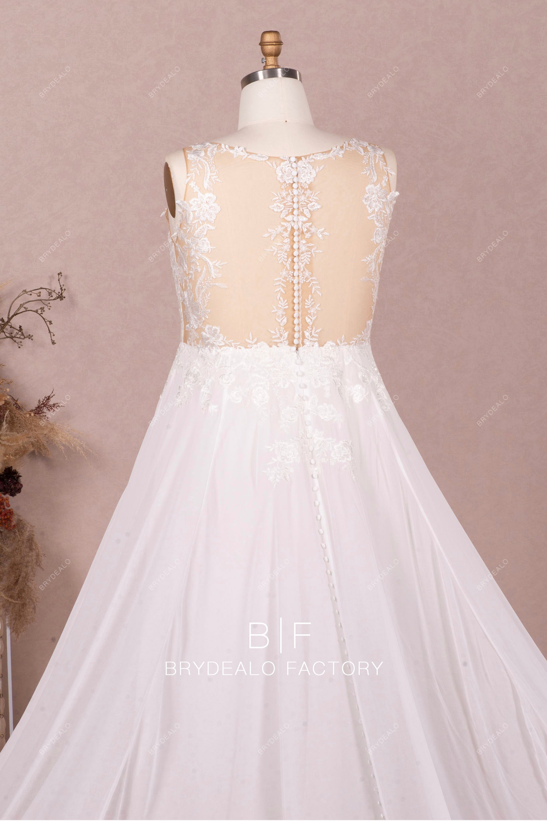 sleeveless sheer lace back designer bridal gown
