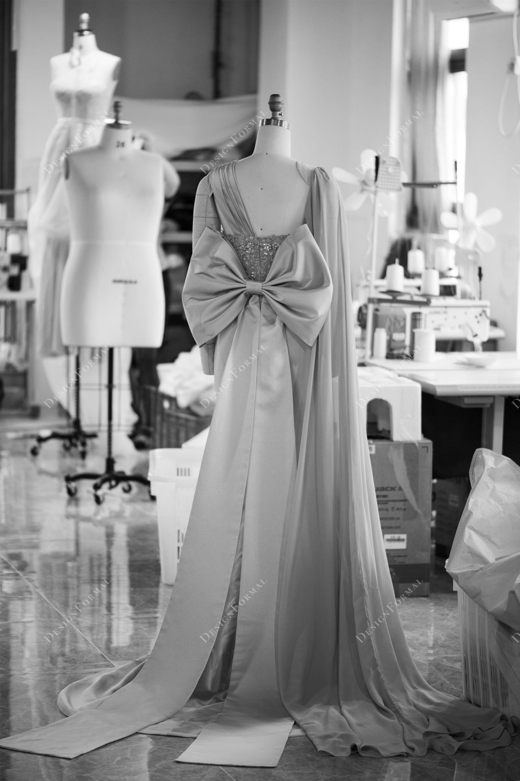 unique one long sleeve big bow prom dress