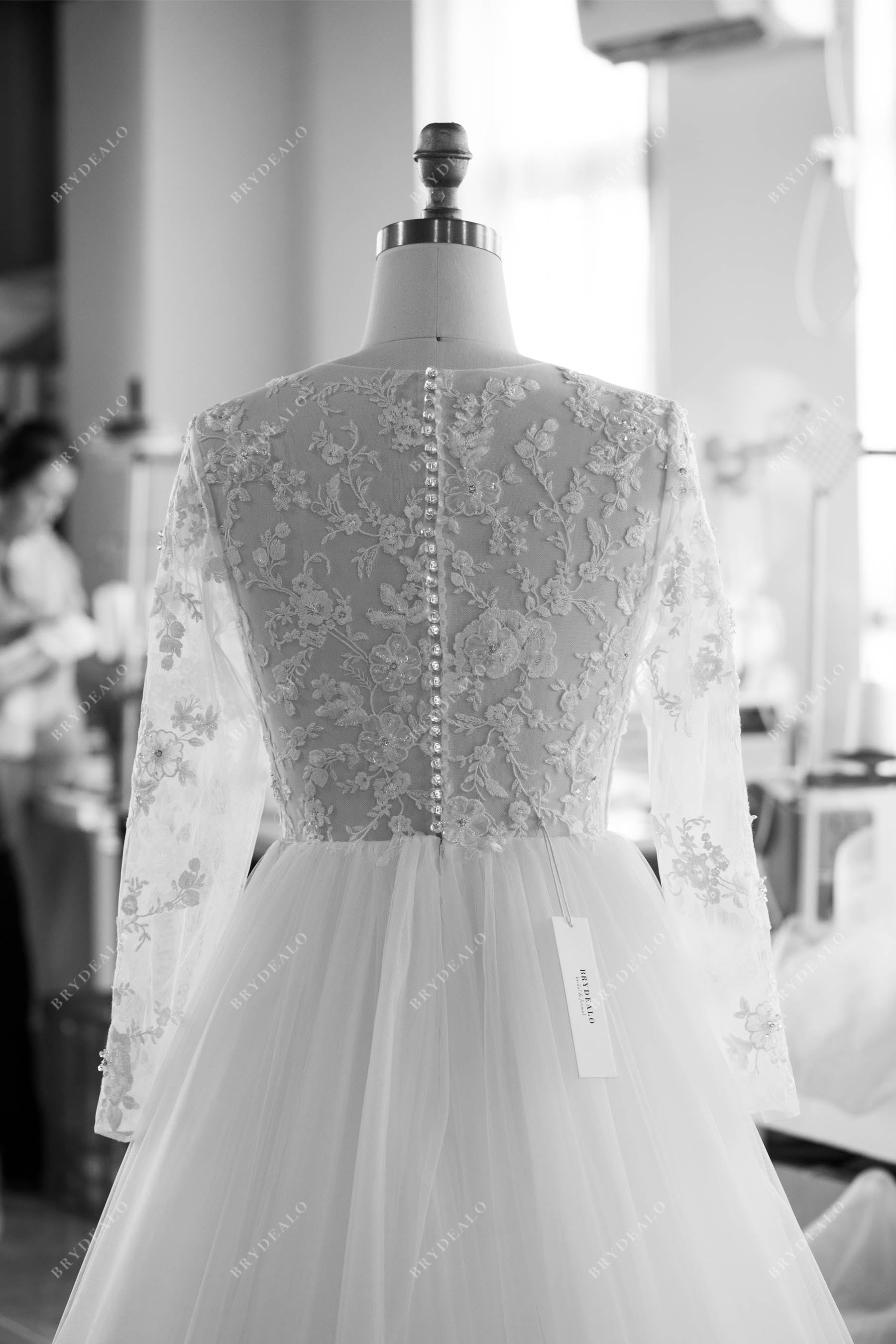 custom illusion buttoned back wedding dress