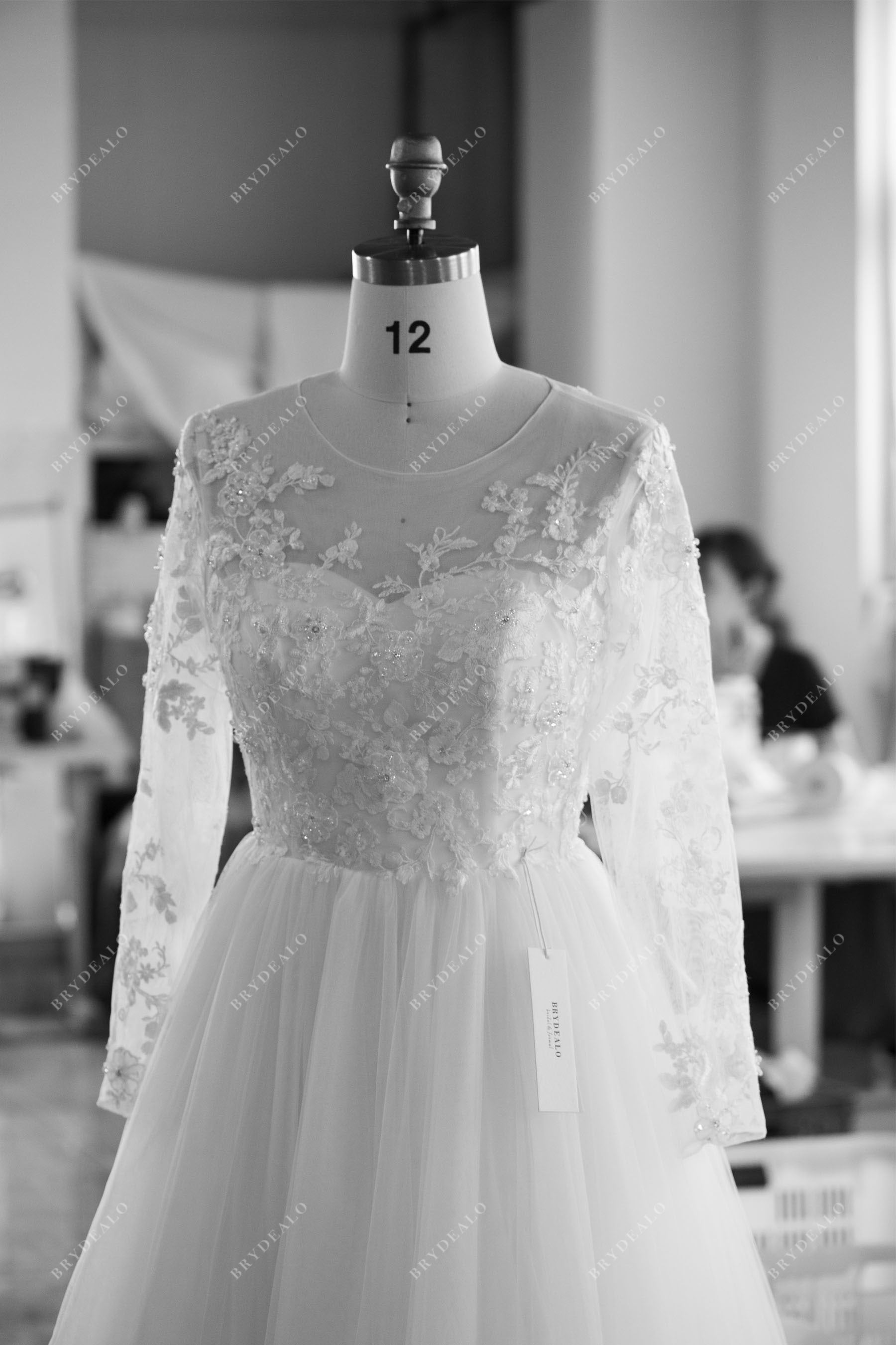 brydealo designed illusion neck sleeved wedding dress