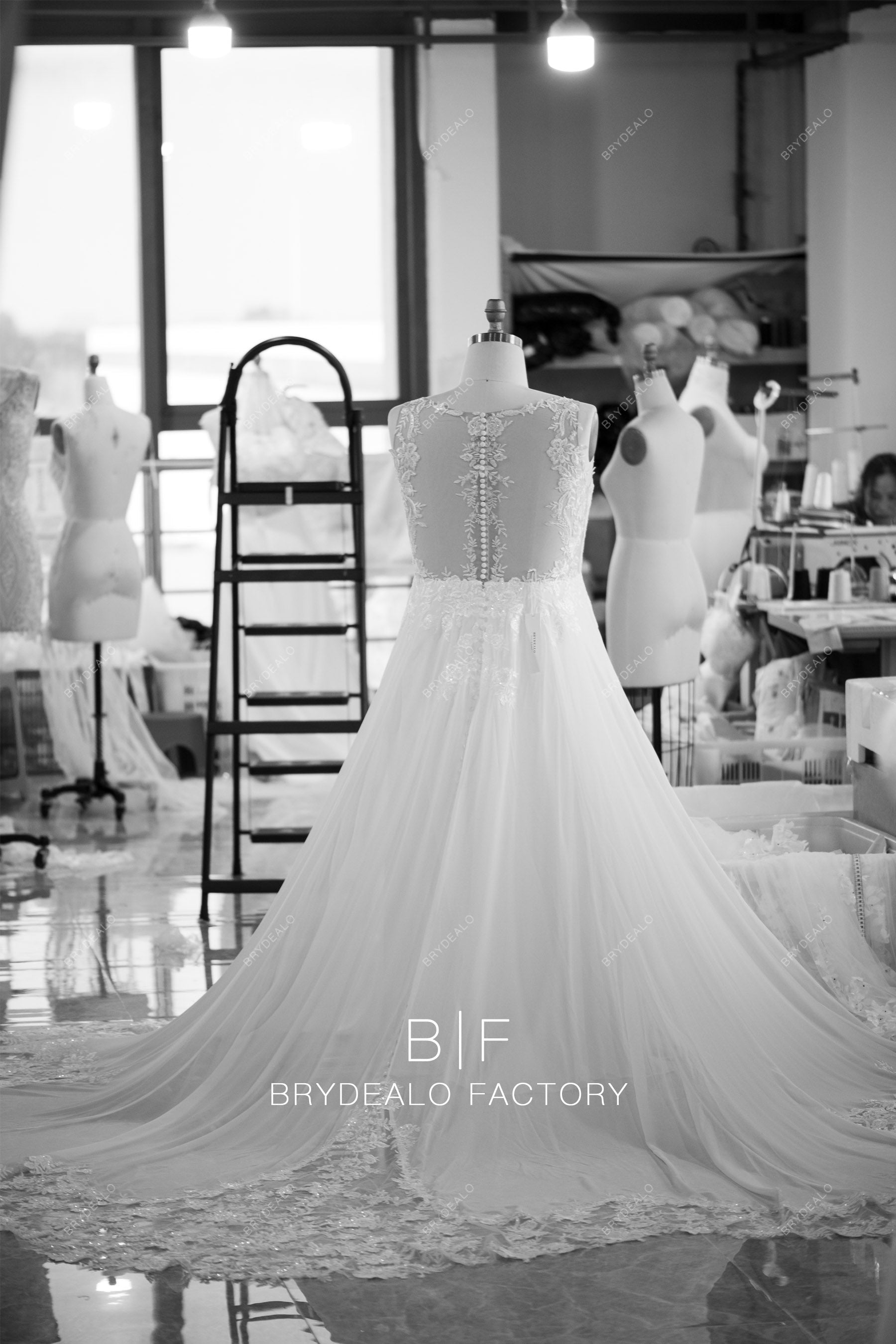 designer cutout lace long train wedding dress