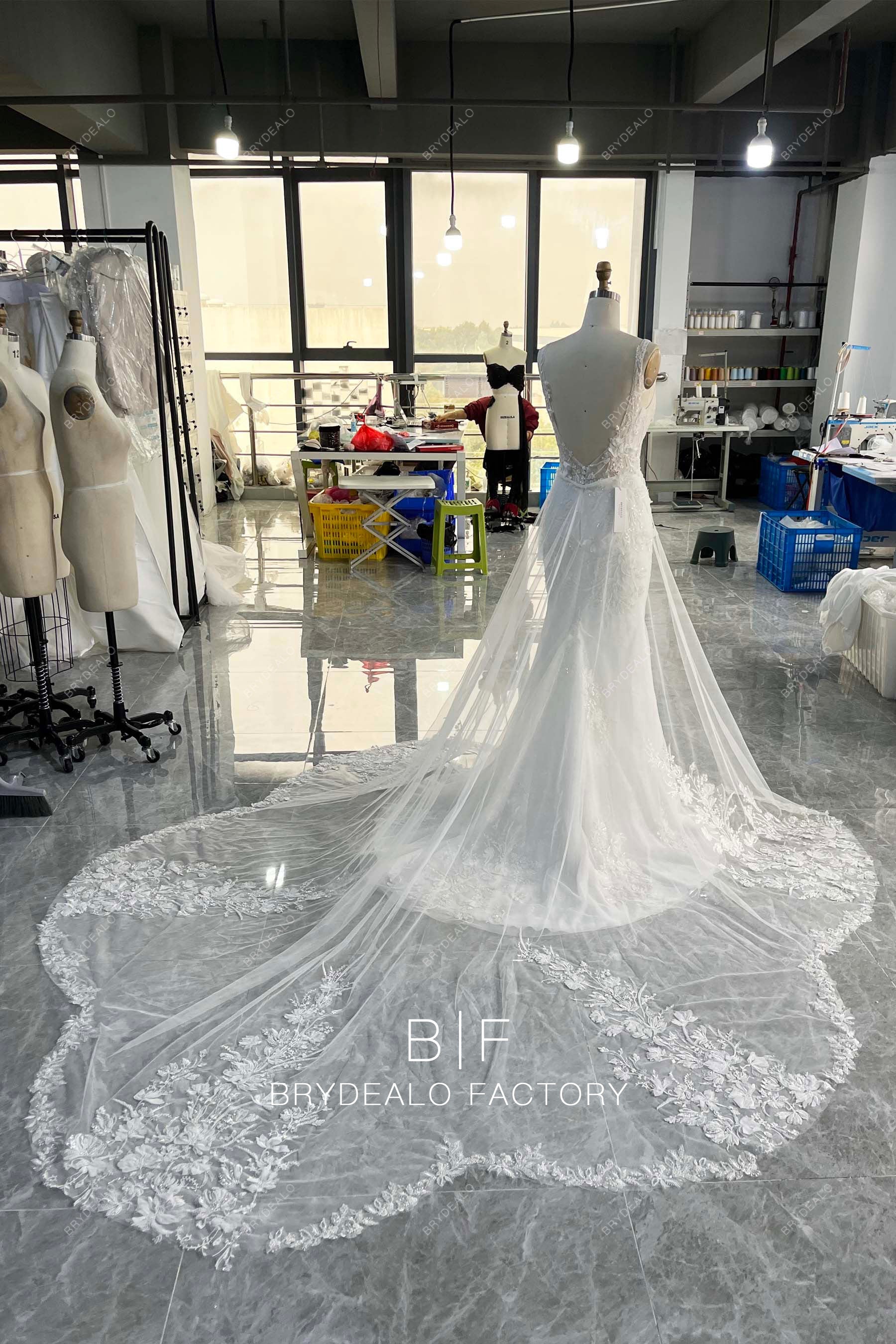 tailored luxury beaded lace wedding dress with overskirt