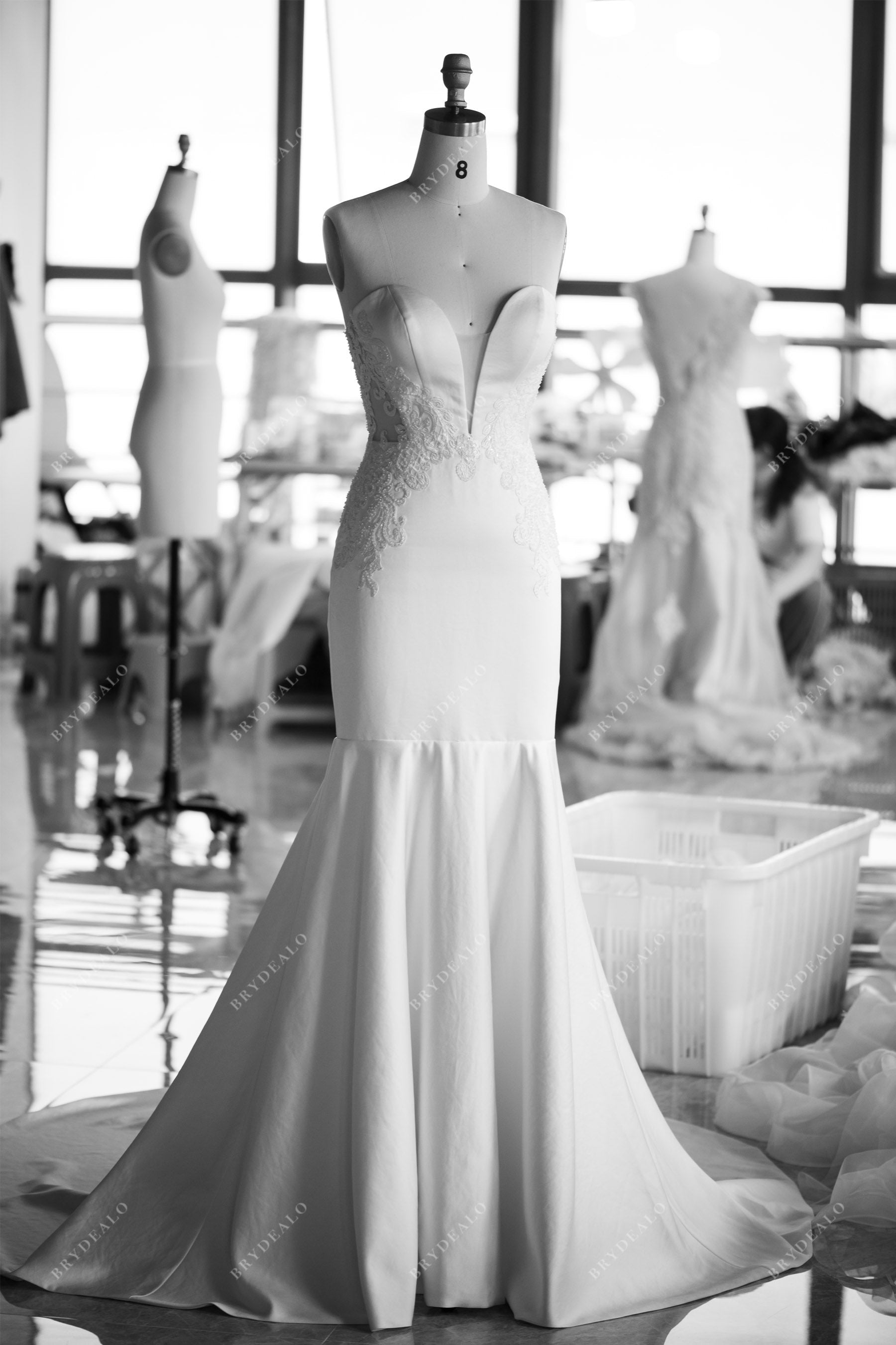 designer plunging strapless mermaid satin wedding dress