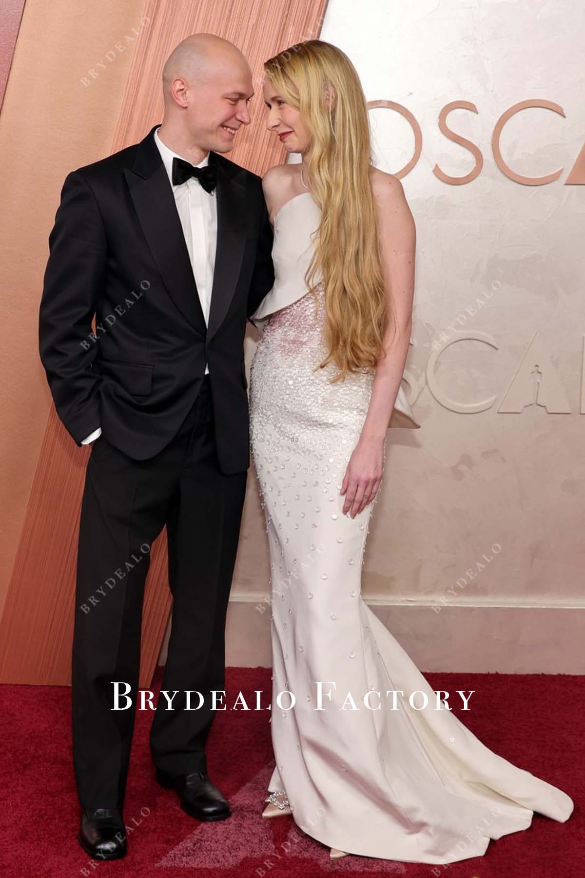 Anna Shevchuk 2025 Oscars red carpet court train dress