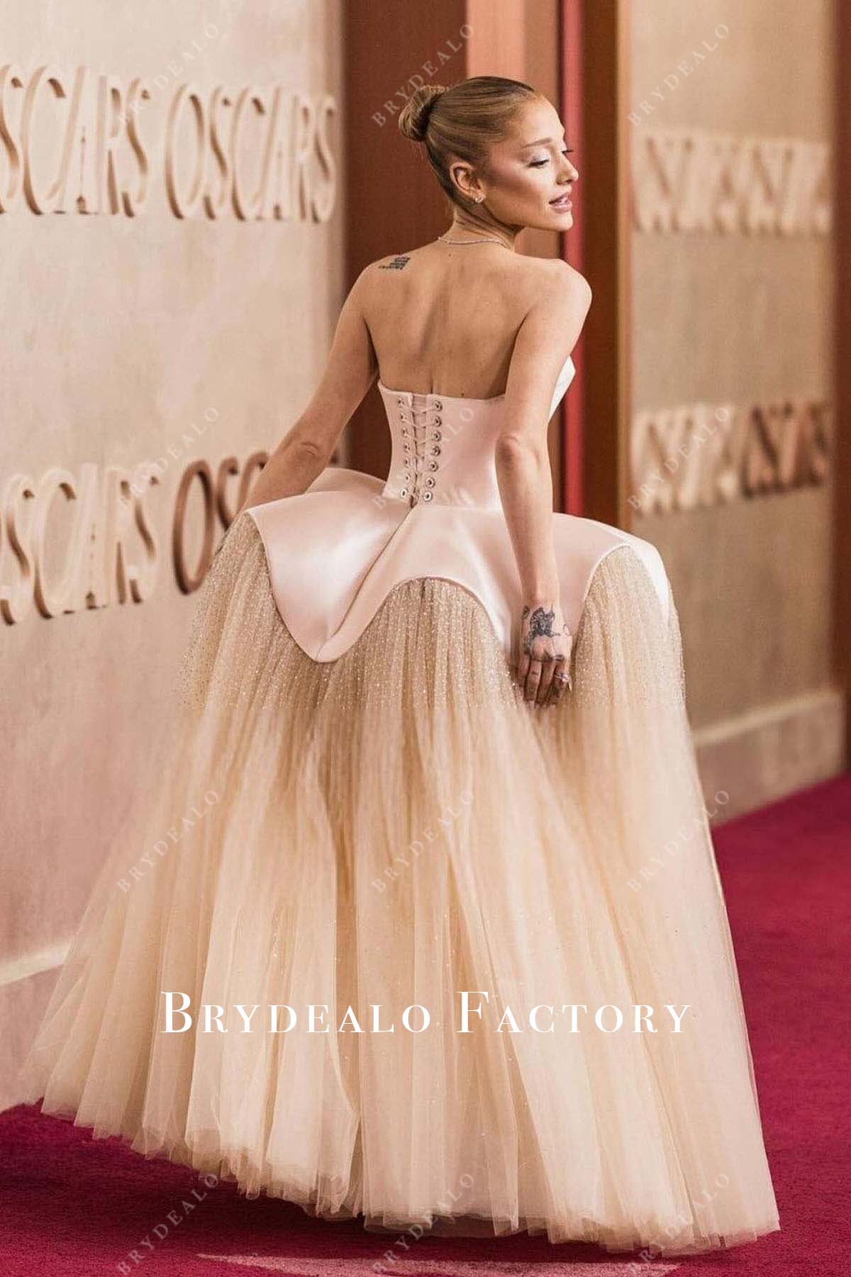 Ariana Grande 2025 Oscars red carpet lace up back dress