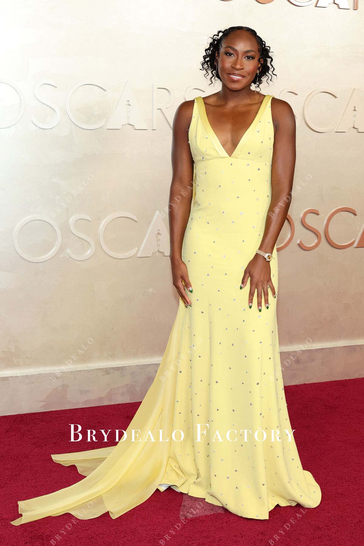 Coco Gauff 2025 Oscars red carpet plunging neck dress