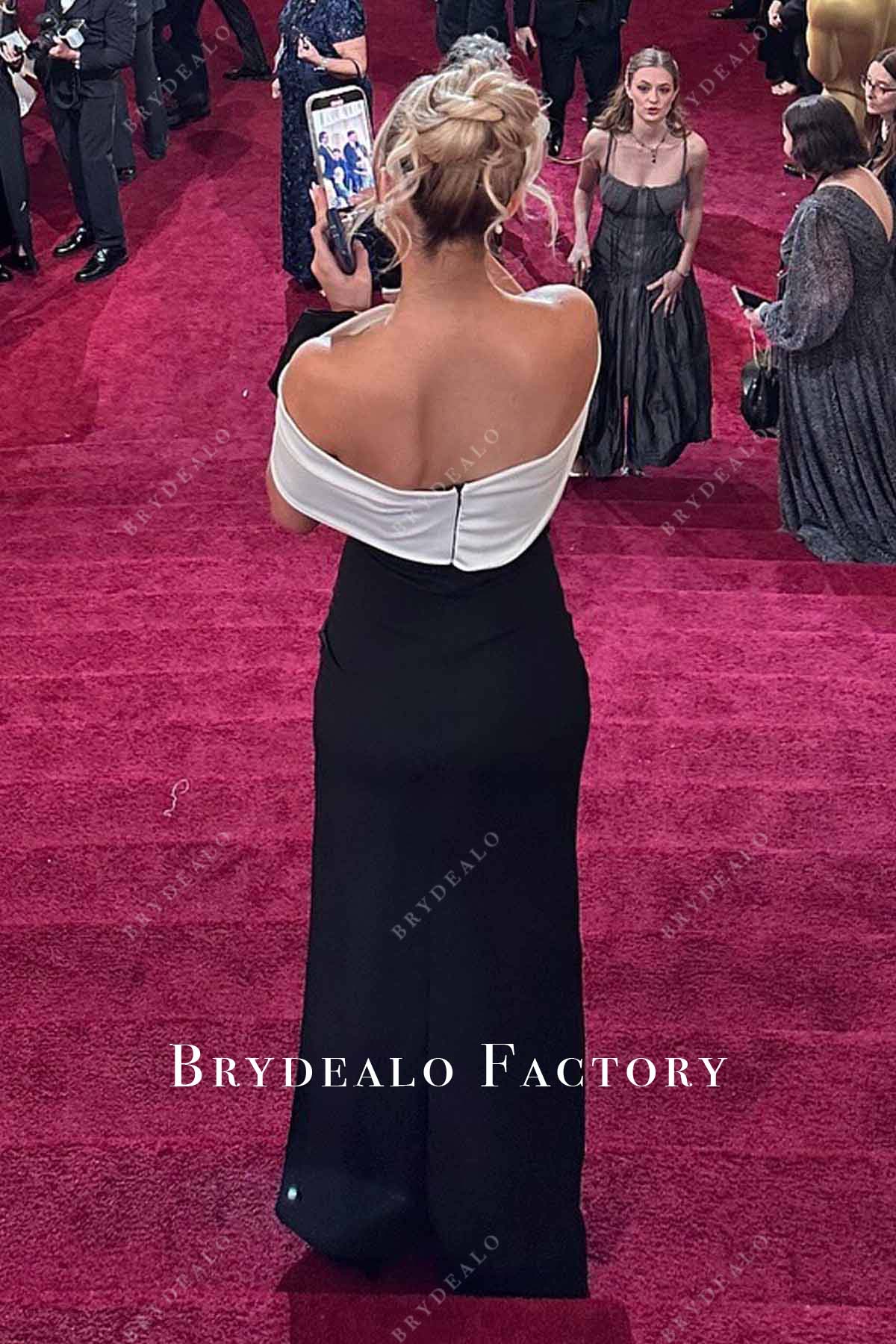 Katie Feeney 2025 Oscars red carpet open back dress