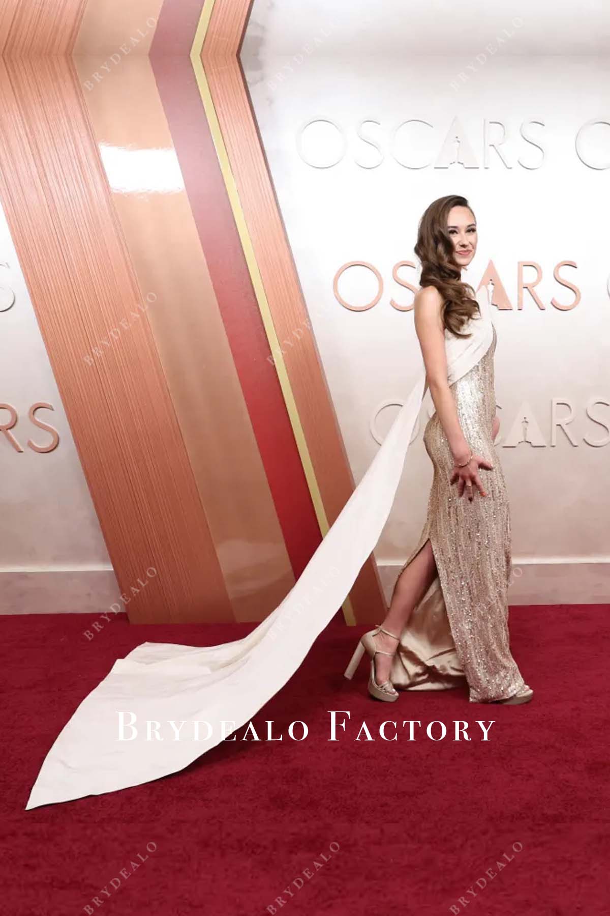 Kensington Tallman 2025 Oscars red carpet back slit dress