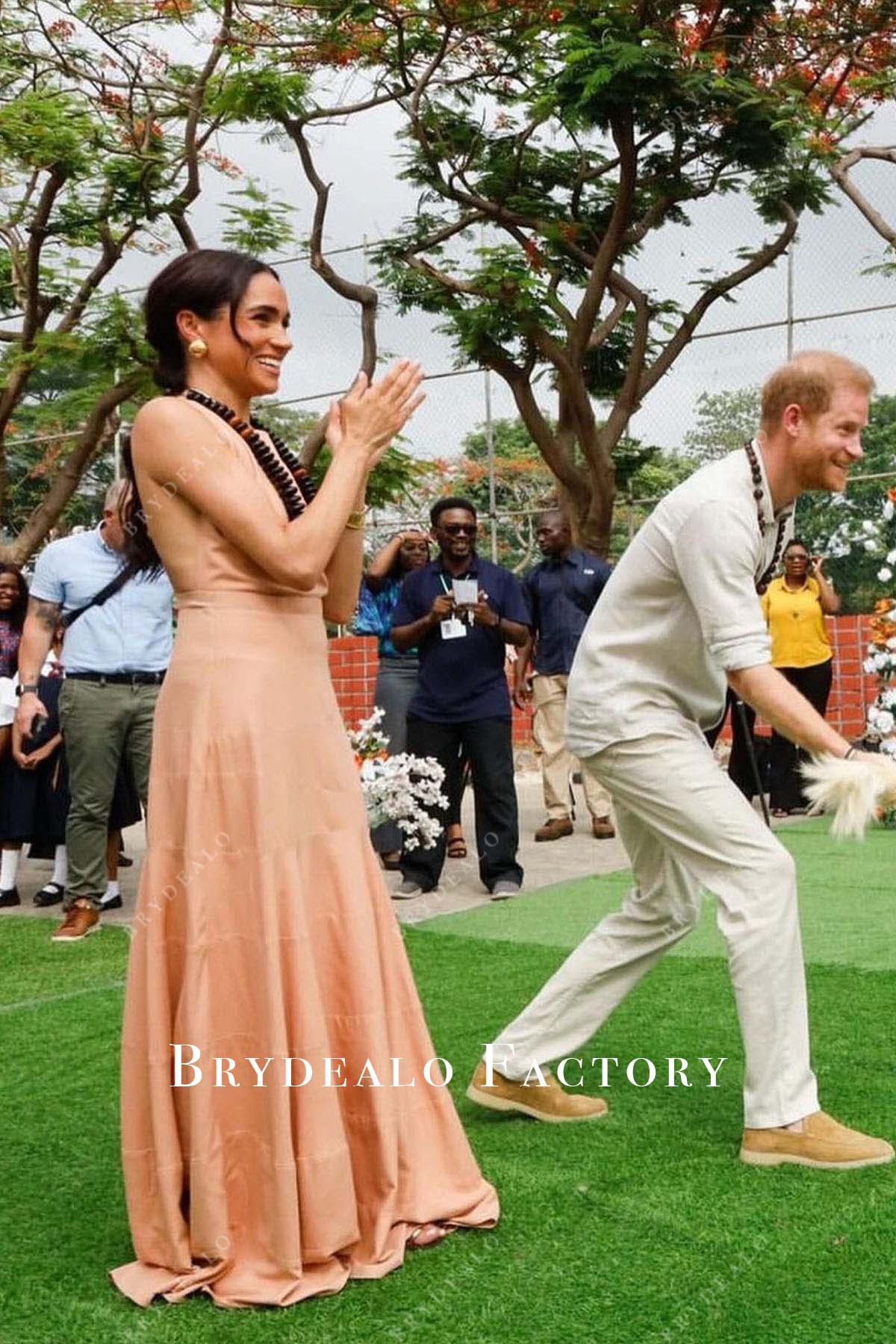 Meghan Markle open back Tour Of Nigeria 2024 dress