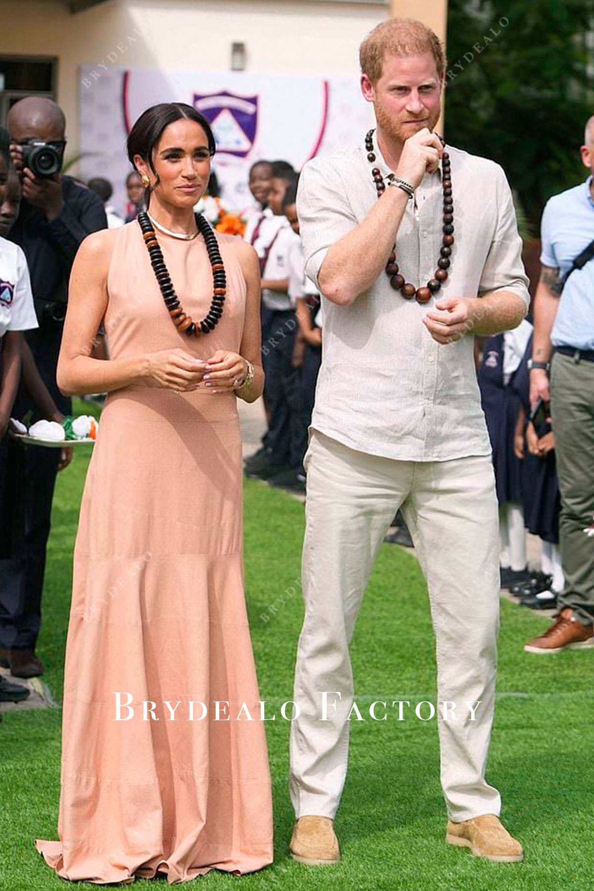 Meghan Markle Tour Of Nigeria 2024 Coral Dress