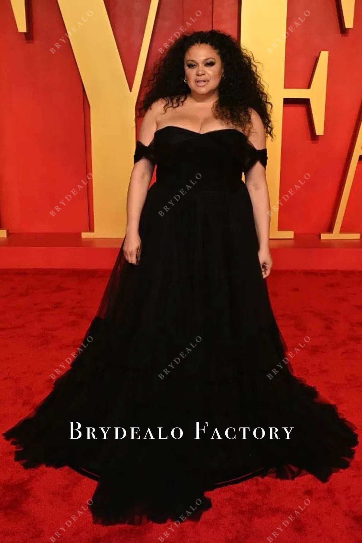 Michelle Buteau off shoulder 2024 Oscars After Party dress