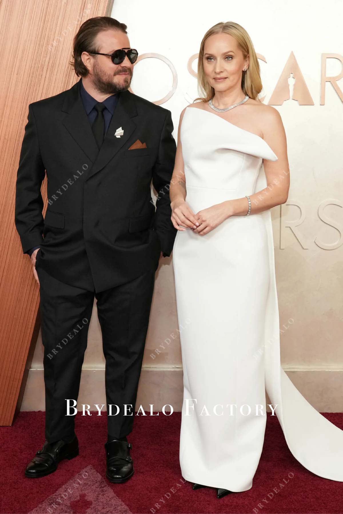 Mona Fastvold white Watteau train 2025 Oscars red carpet dress