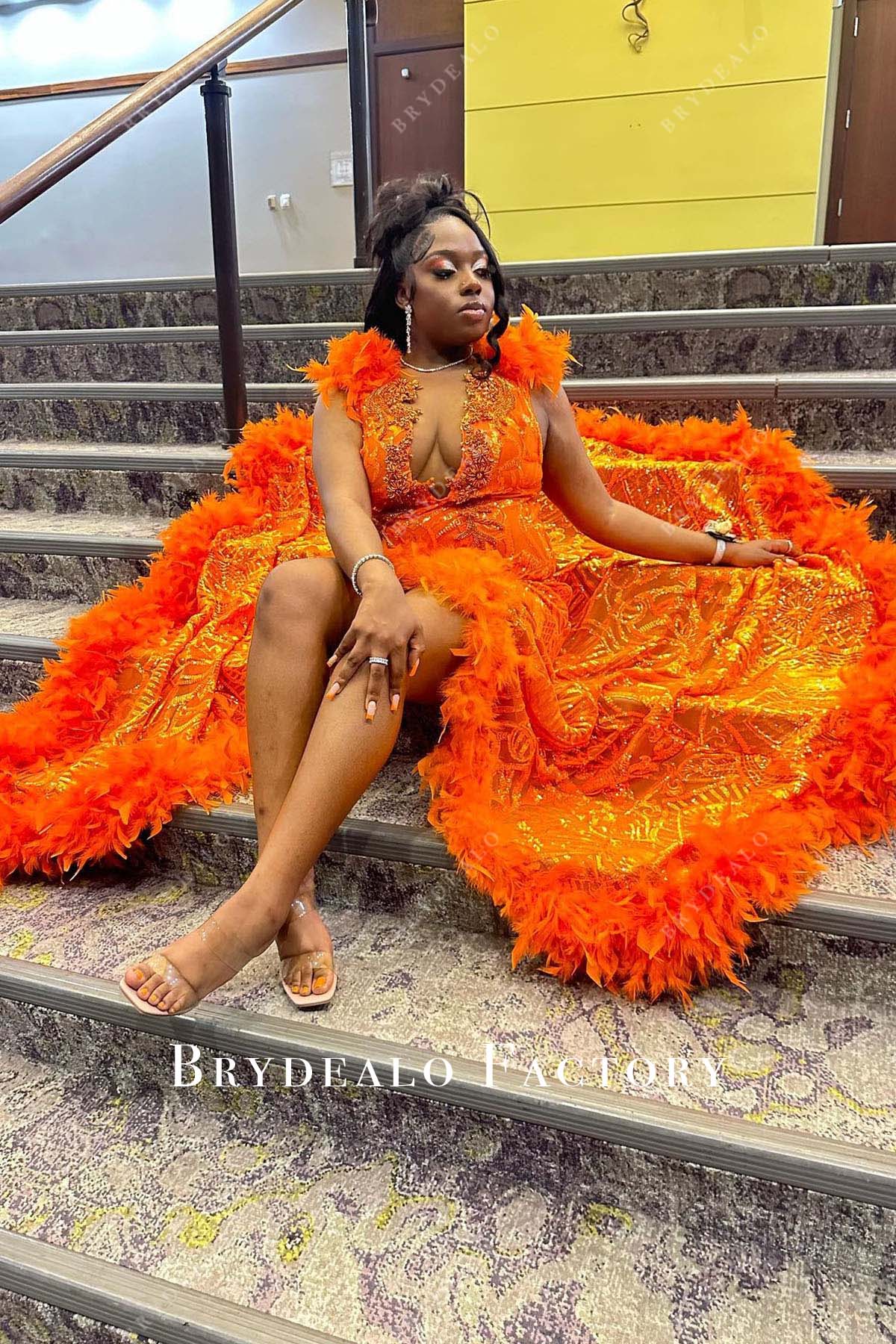 orange sequined slit feathered prom dress