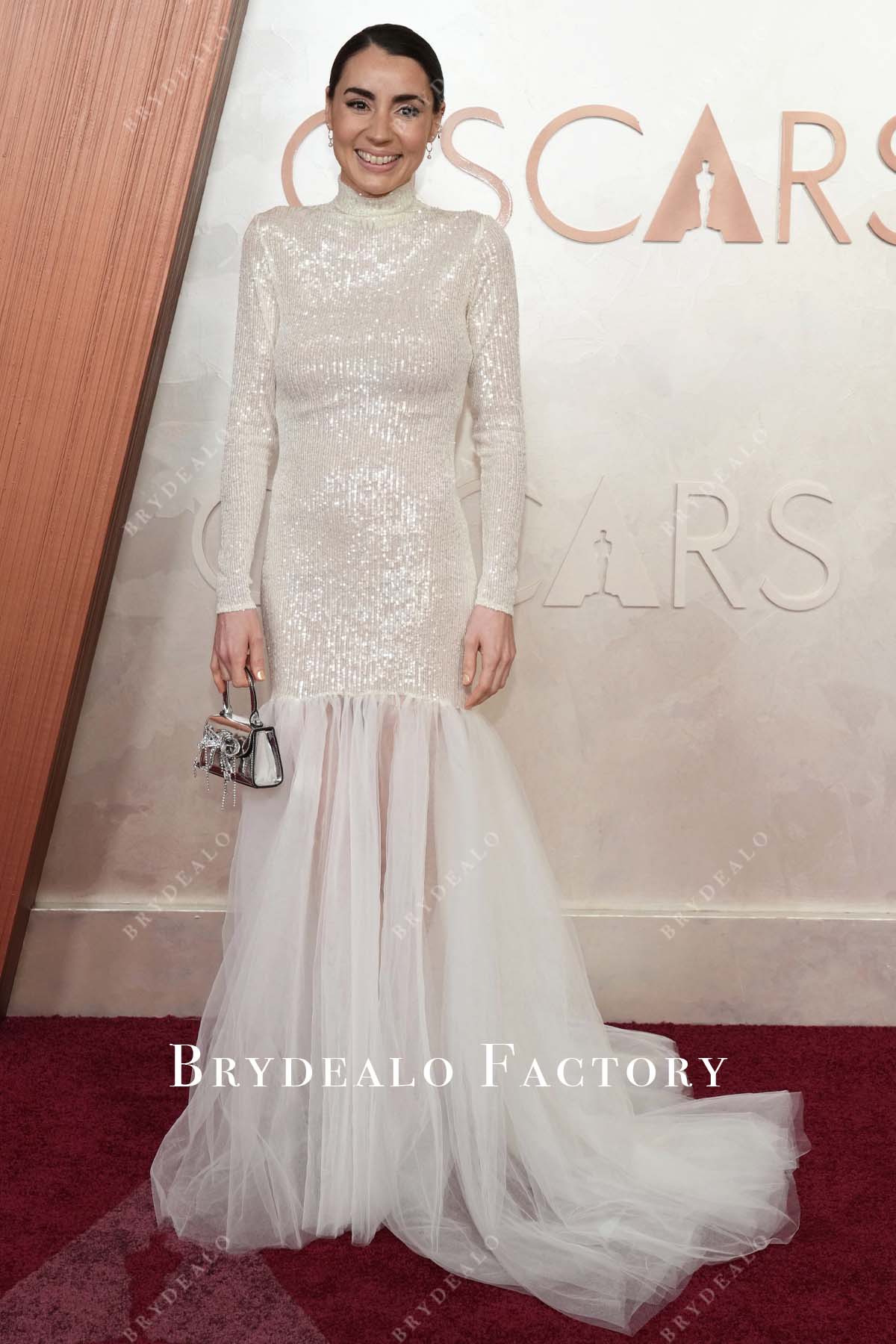 Sarah Nuth white glitter 2025 Oscars red carpet dress