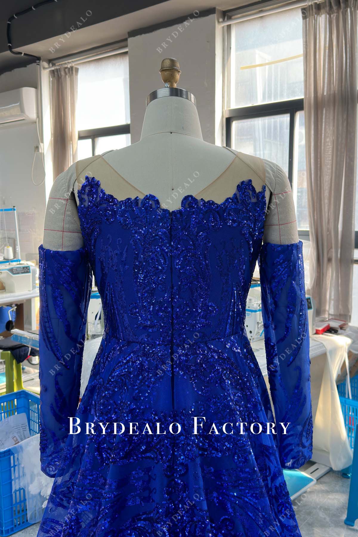 V-back royal blue sequin long sleeve formal gown