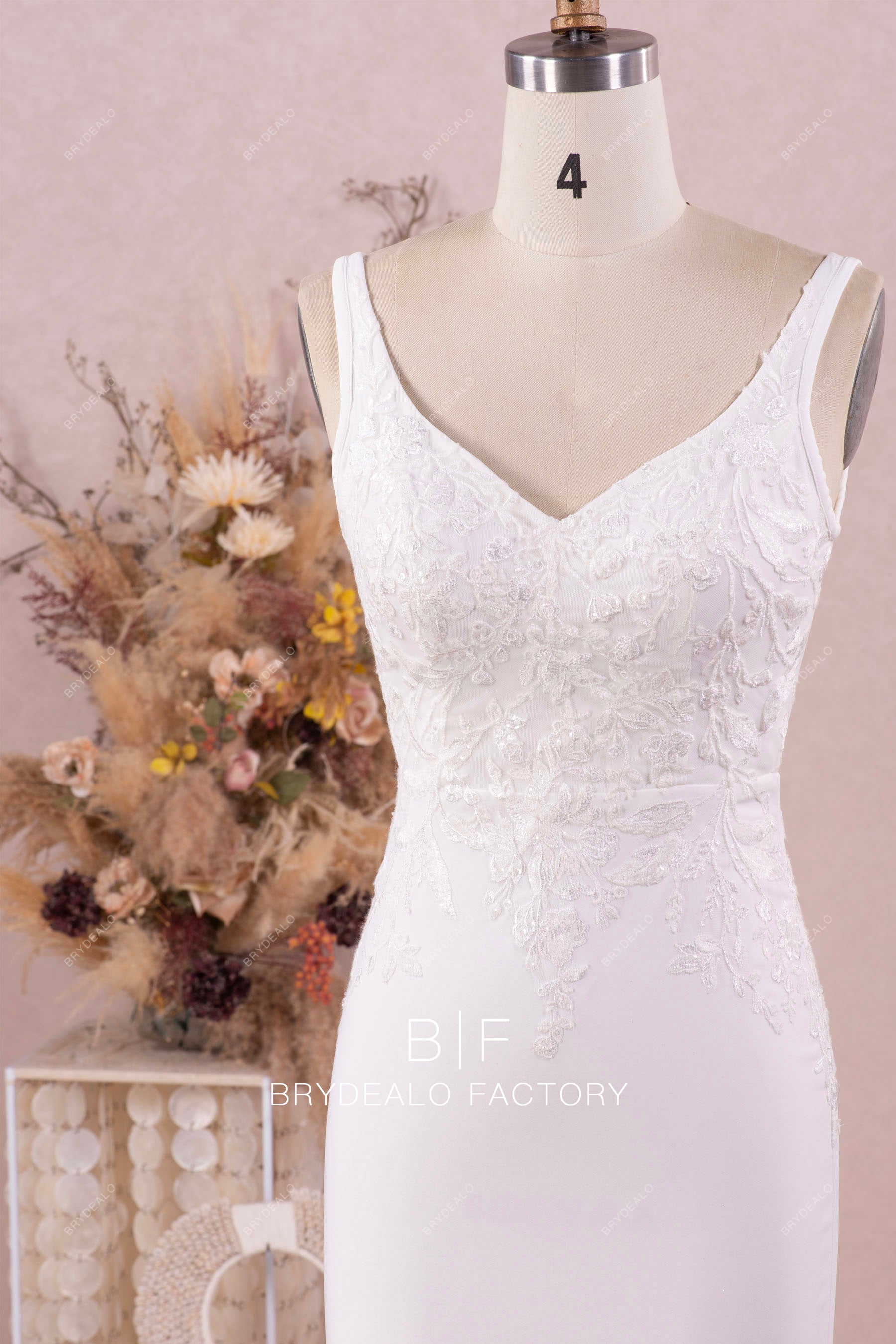 sleeveless V-neck crepe white bridal gown