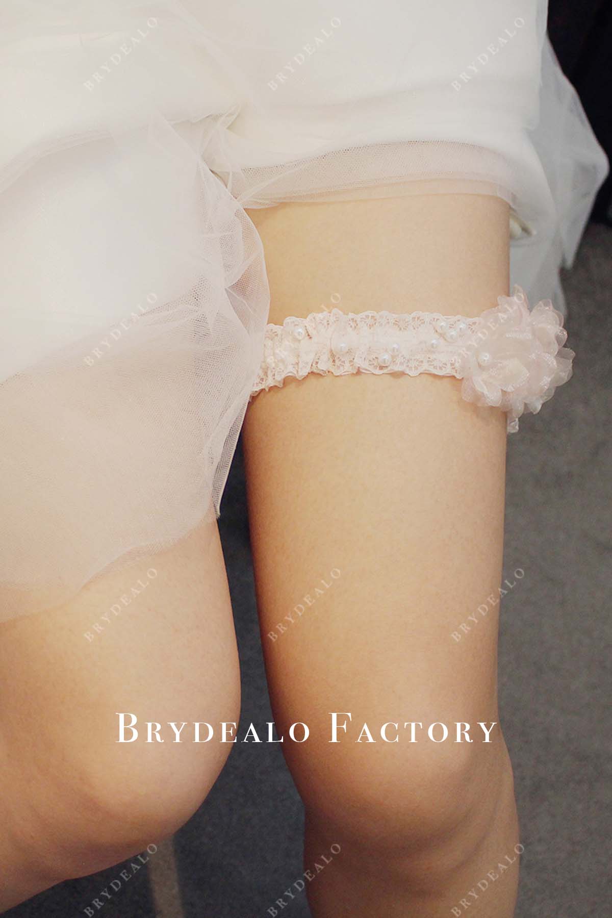 blushing pink beaded lace wedding garter
