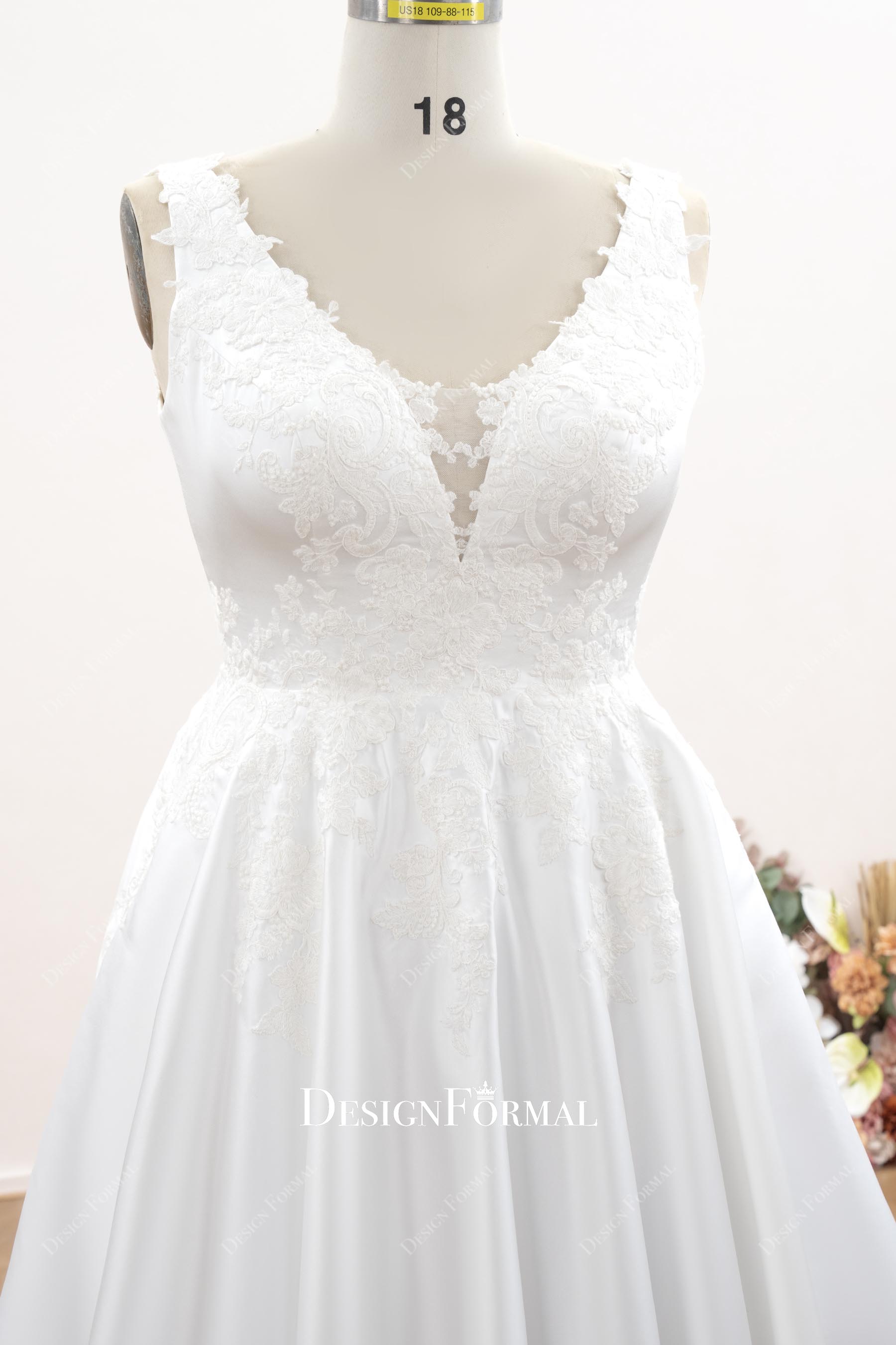 deep V-neck sleeveless wedding dress