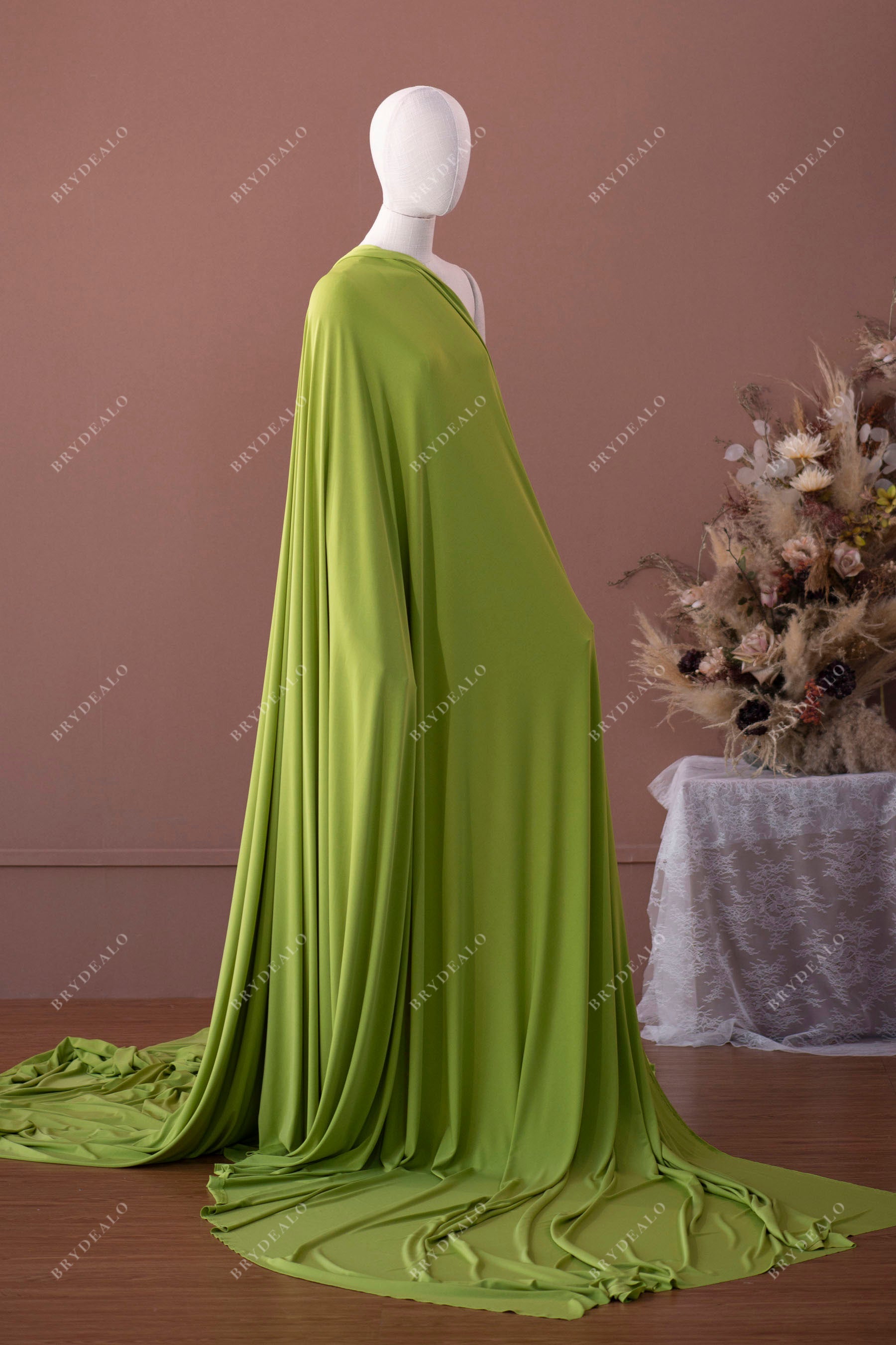 draping green jersey fabric